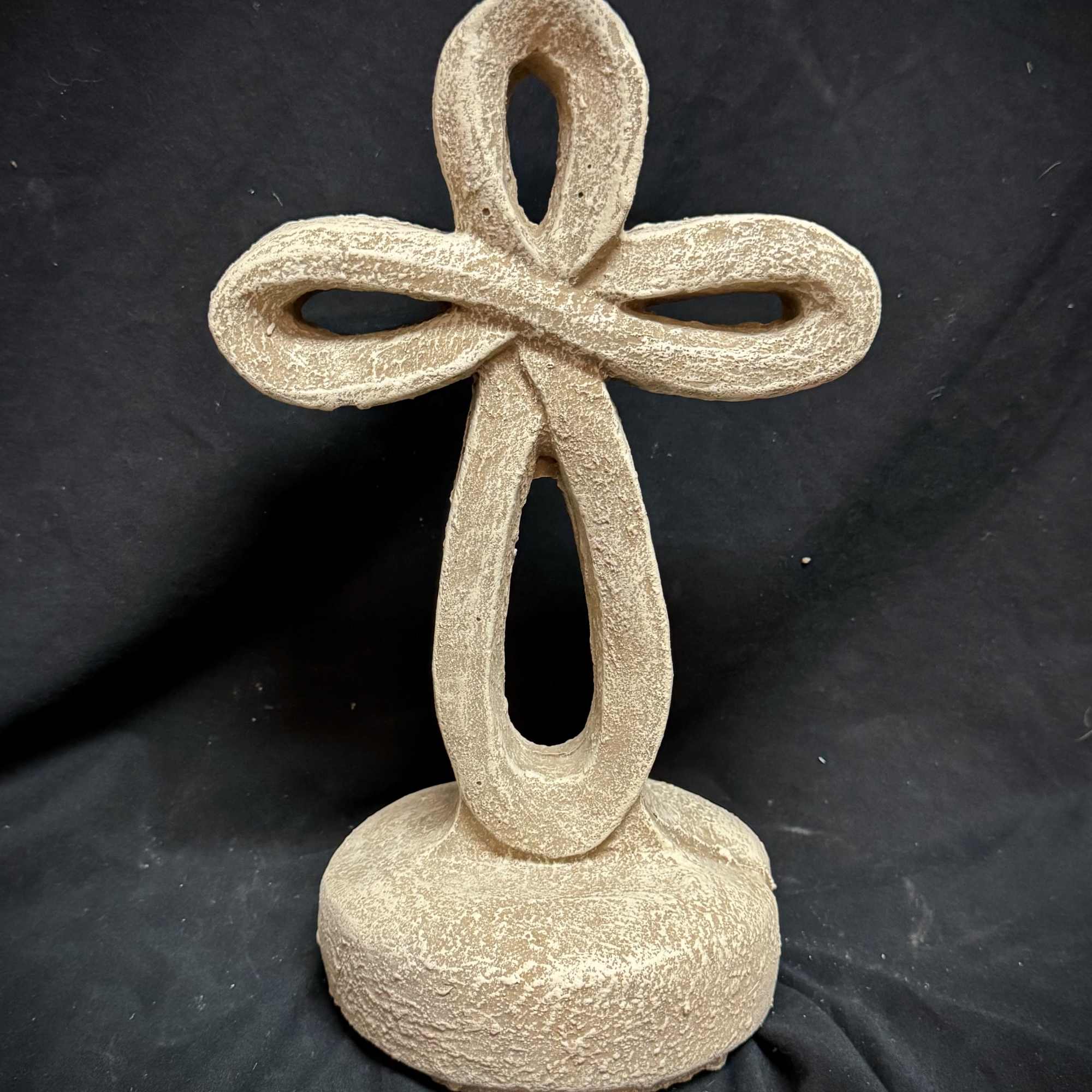 Our 12-inch cement eternity cross is a beautifully crafted symbol of faith