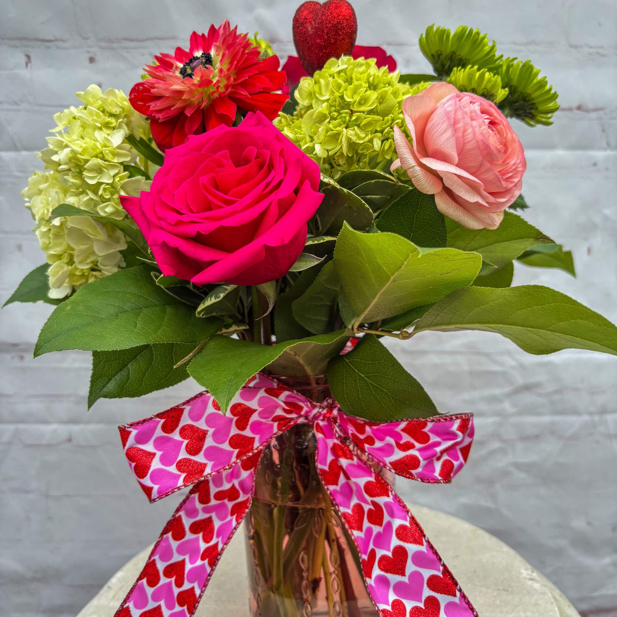 Charming Arrangement with green Hydrangea, green Spider Mums, Roses, Orchids, Anemones and