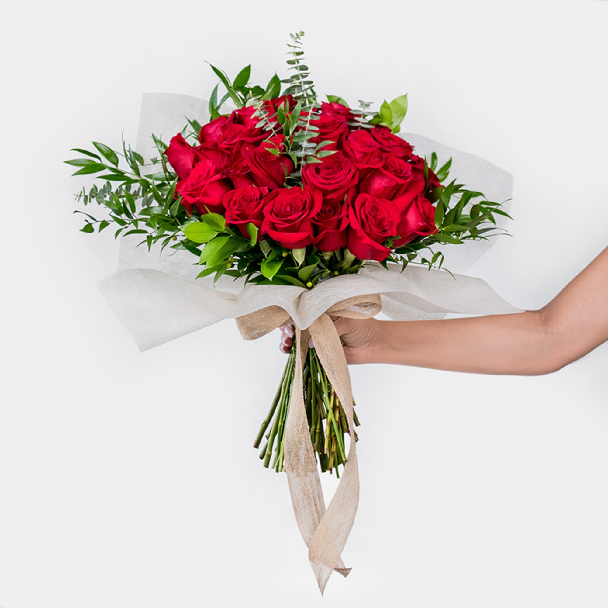 Our 24 Carat bouquet showcases 24 luxurious long-stemmed red roses, hand-tied with
