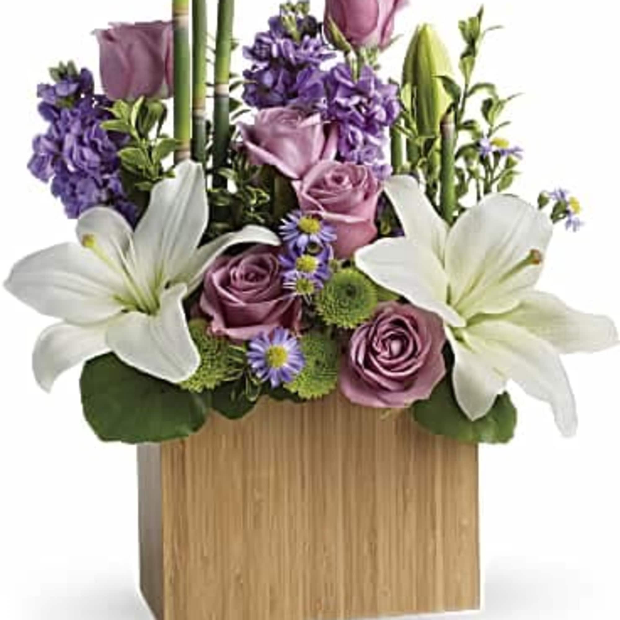   This bouquet lavender roses, white asiatic lilies, lavender stock, monte