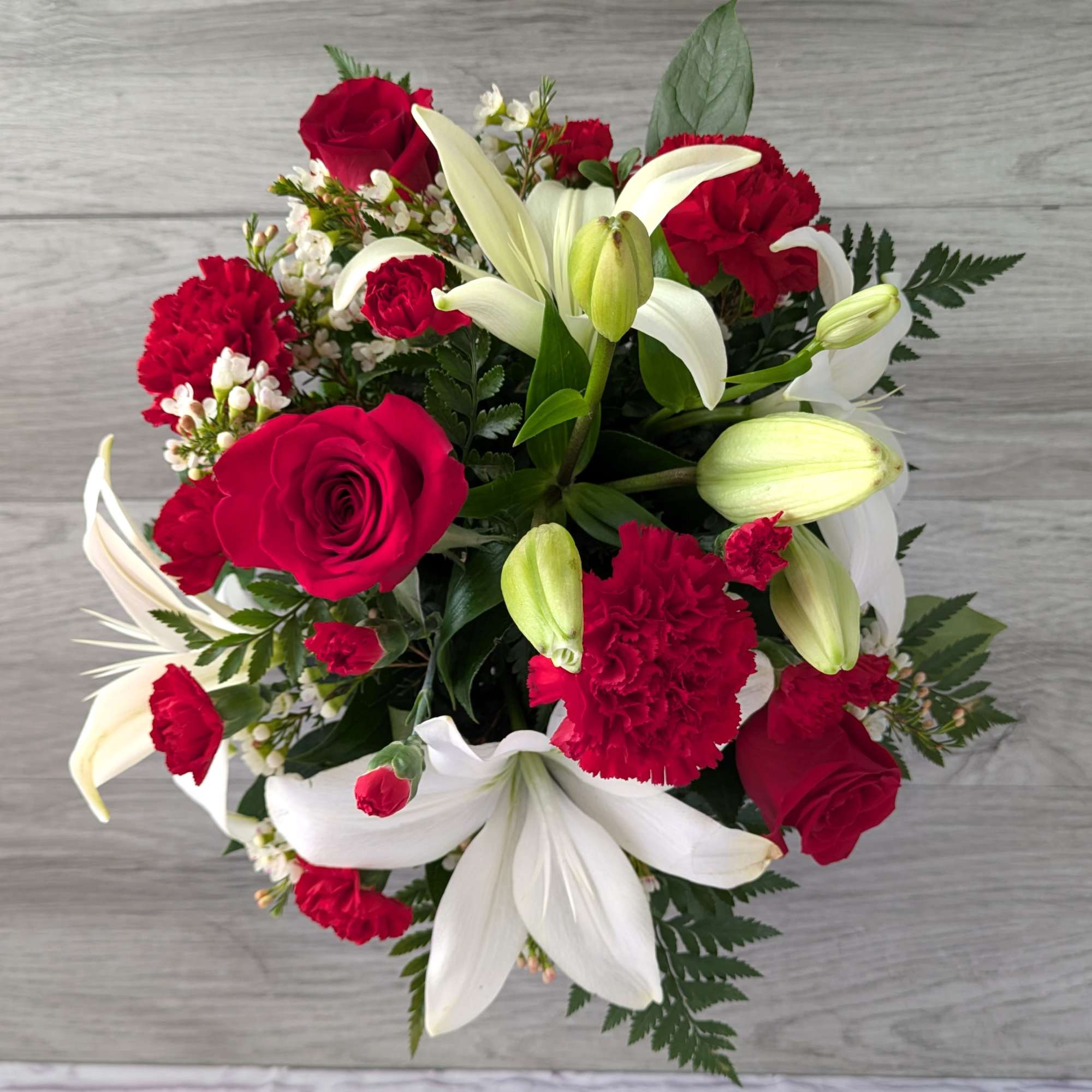 Classical Romance is A Ladybug Floral exclusive bouquet. This bouquet features asiatic