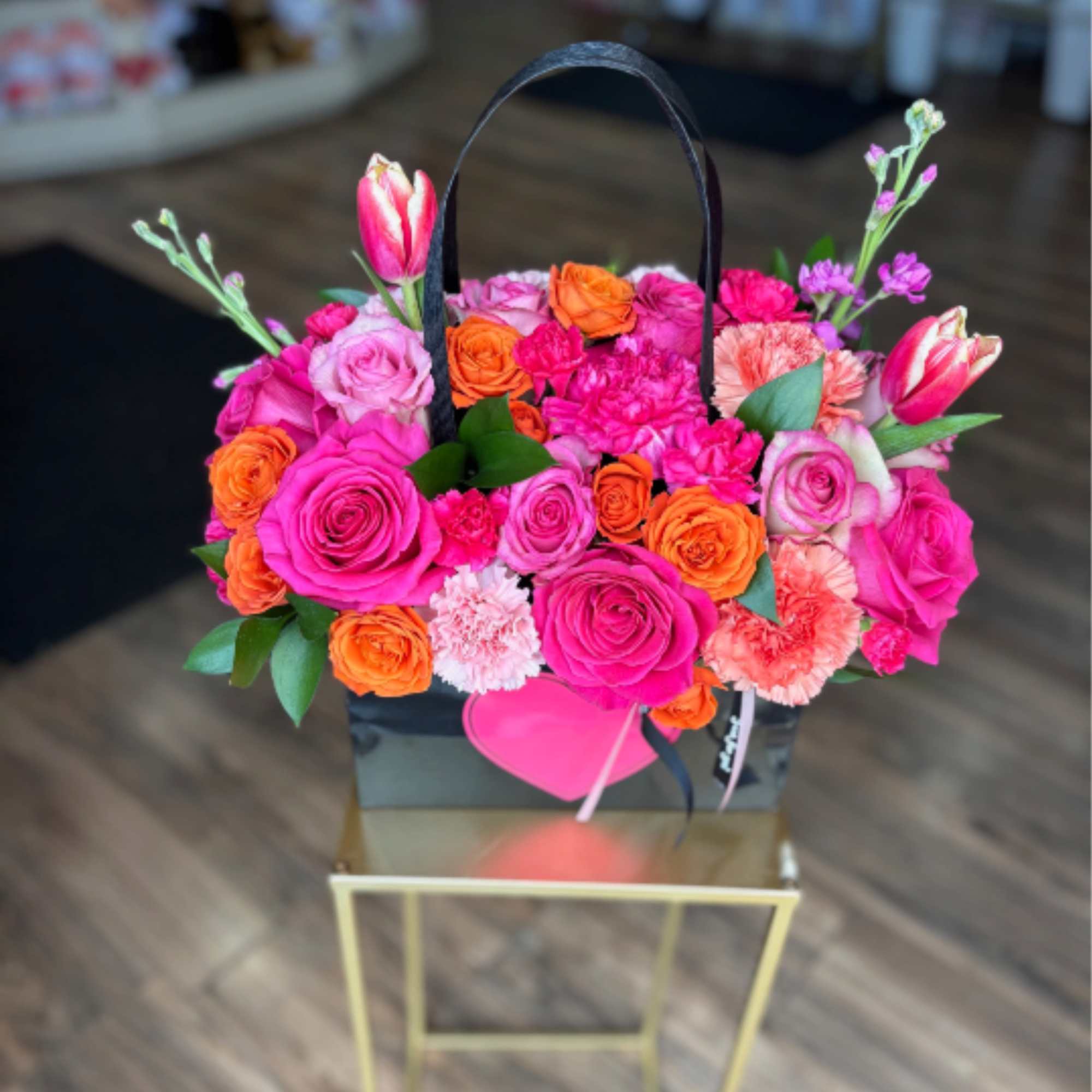  Our best-selling Tote bouquet is gathered with a mix of Vibrant