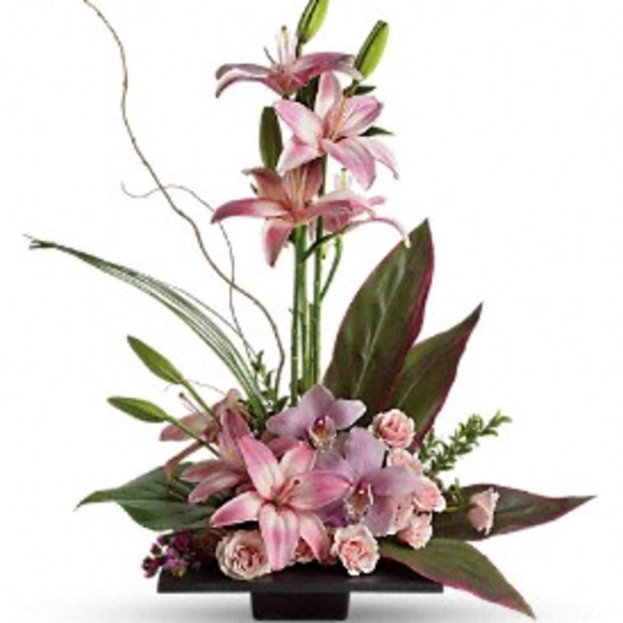 This towering topiary of asiatic lilies, orchids and roses - artistically arranged