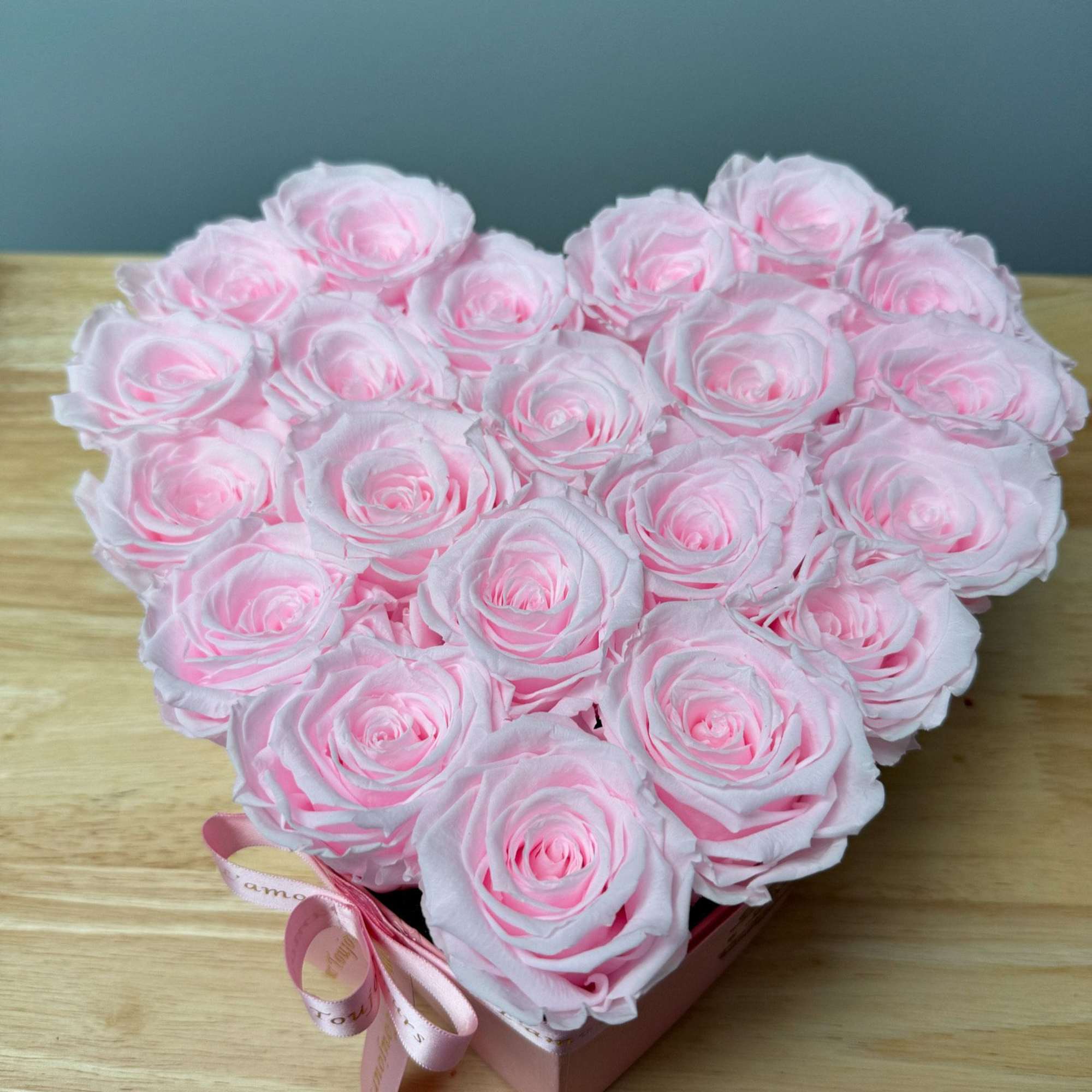Premium Everlasting roses in our heart-shaped signature box. Everlasting roses are real