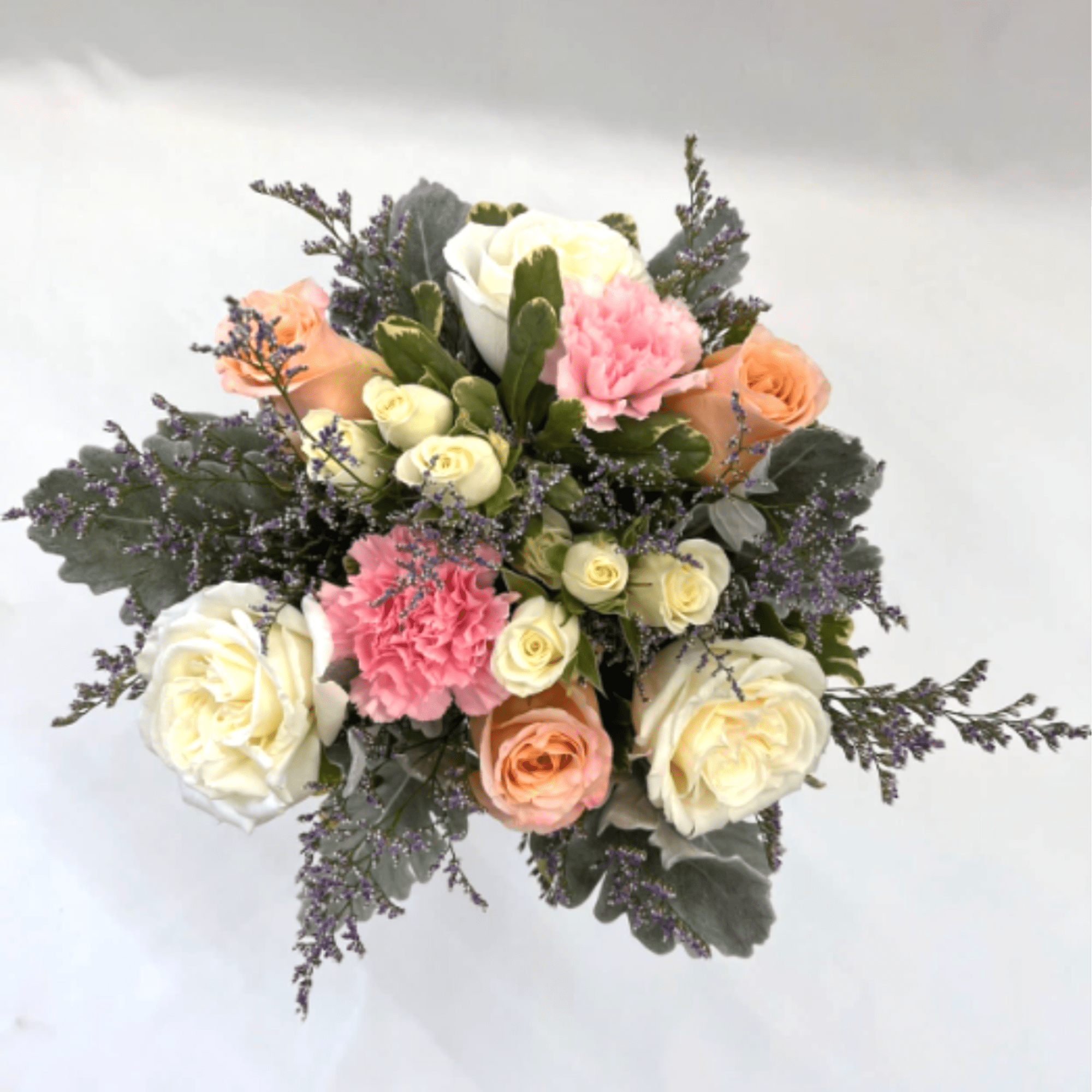 Sweet &amp; Subtle by BloomNation&trade; 

Graceful floral arrangement designed to express love