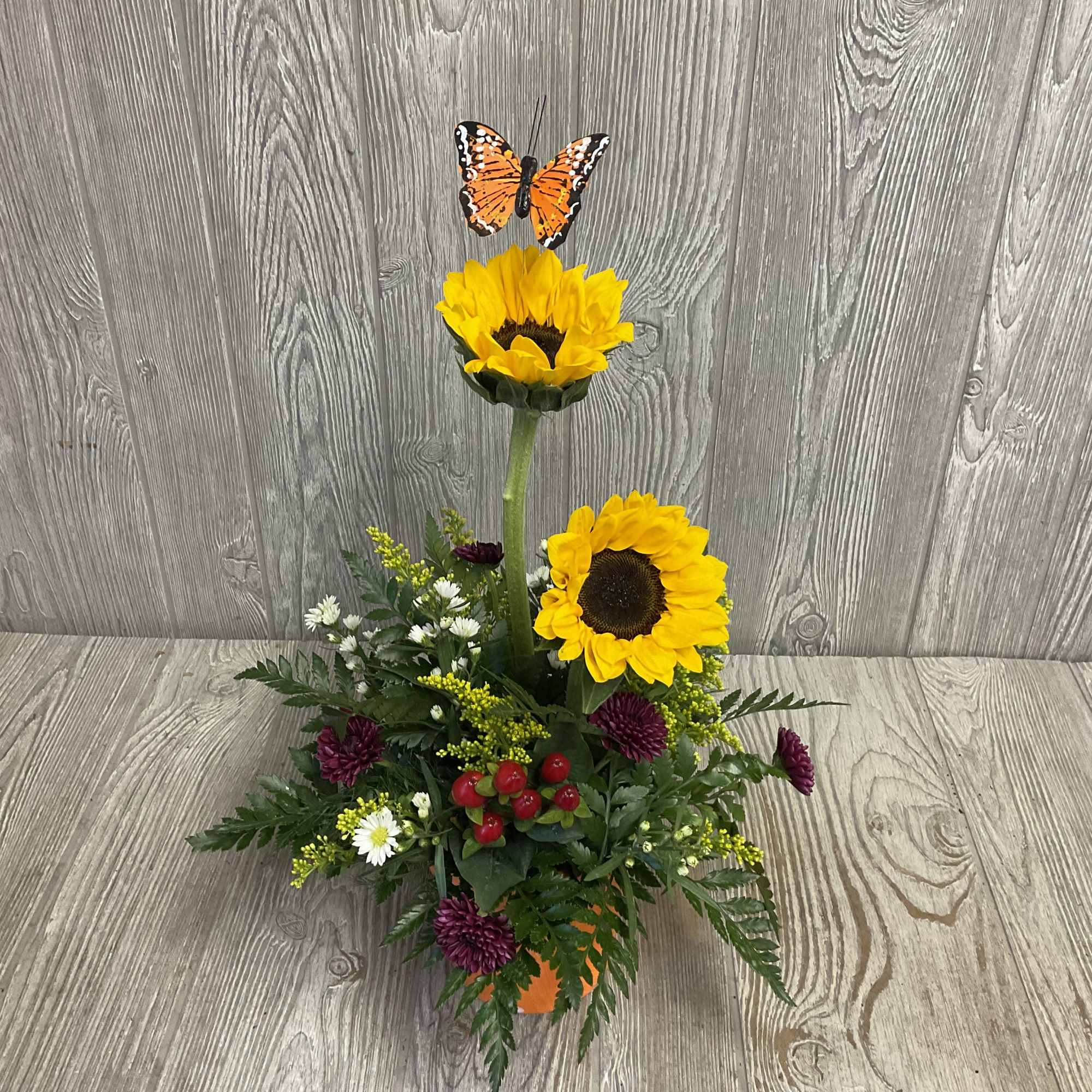 Envision a warp pipe with a sunflower coming out of it. Flowers