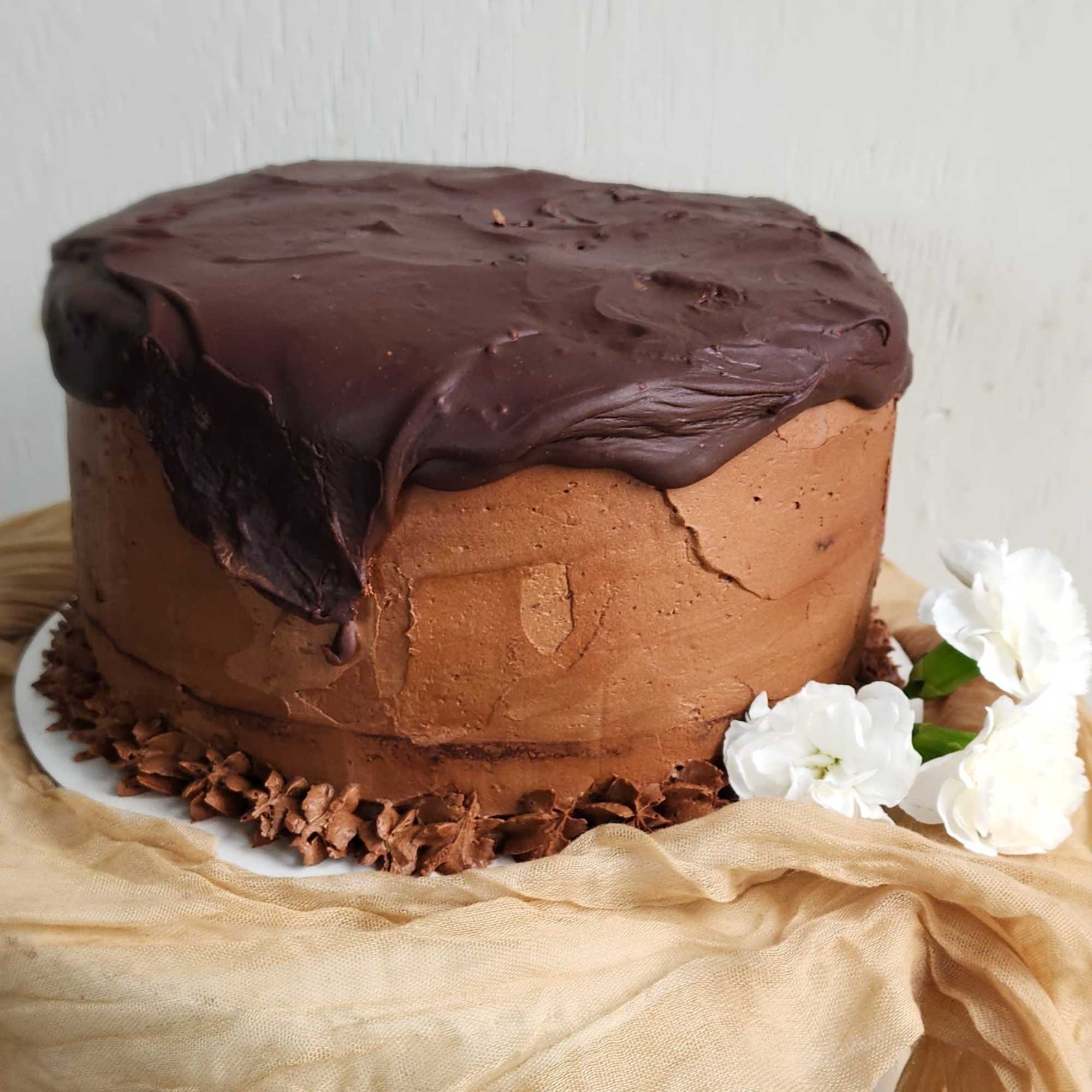 Scrumptious chocolatey goodness.  The whole cake should feed 24 people. Dimensions
