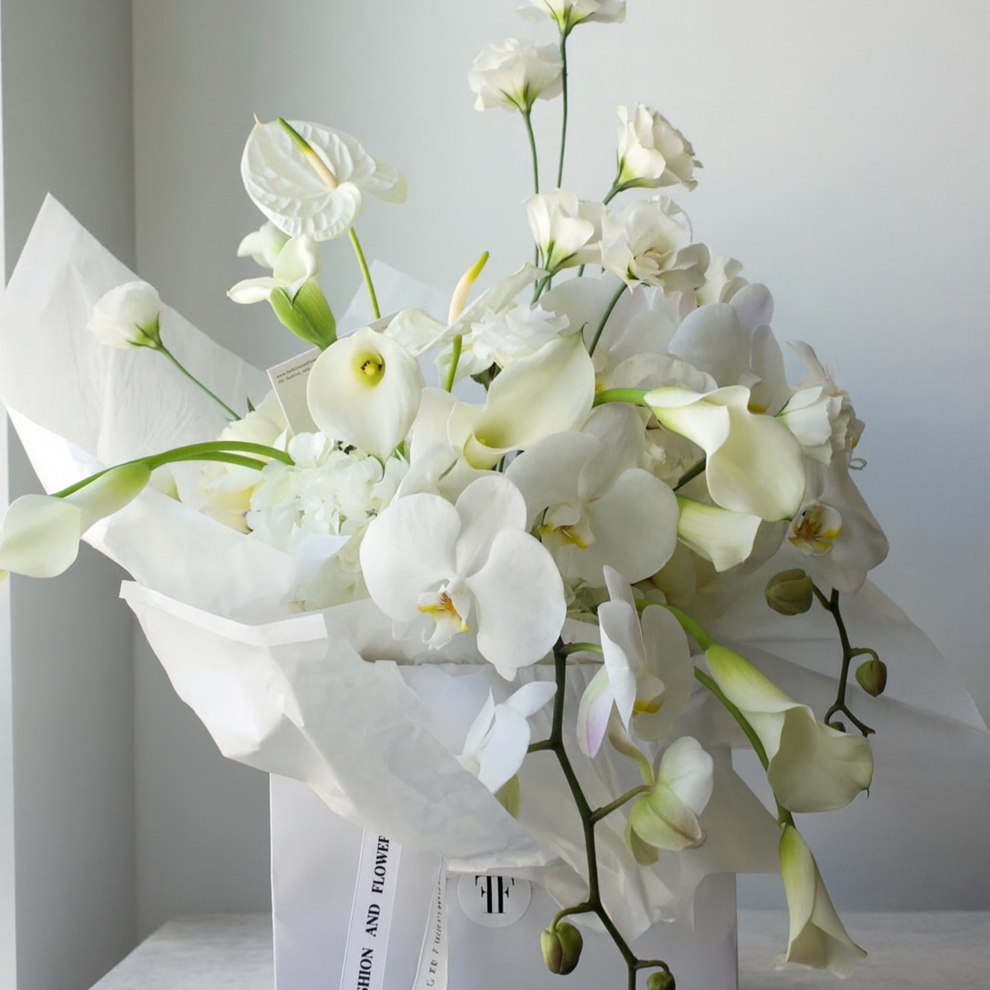 White Couture is a refined all-white arrangement designed in our signature Fashion