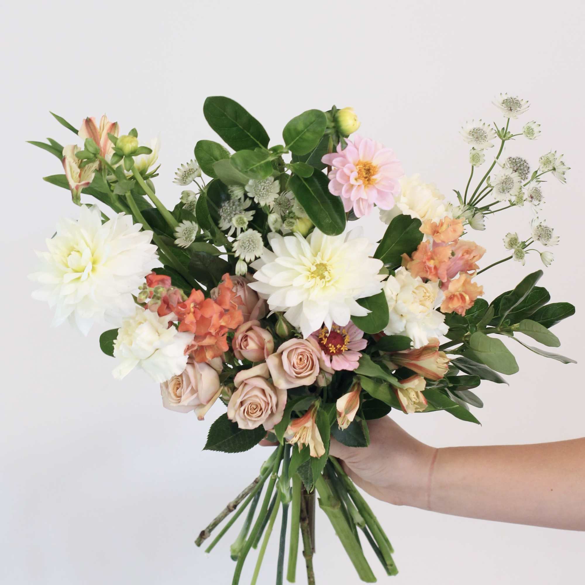 Experience a one of a kind floral arrangement, thoughtfully designed by our