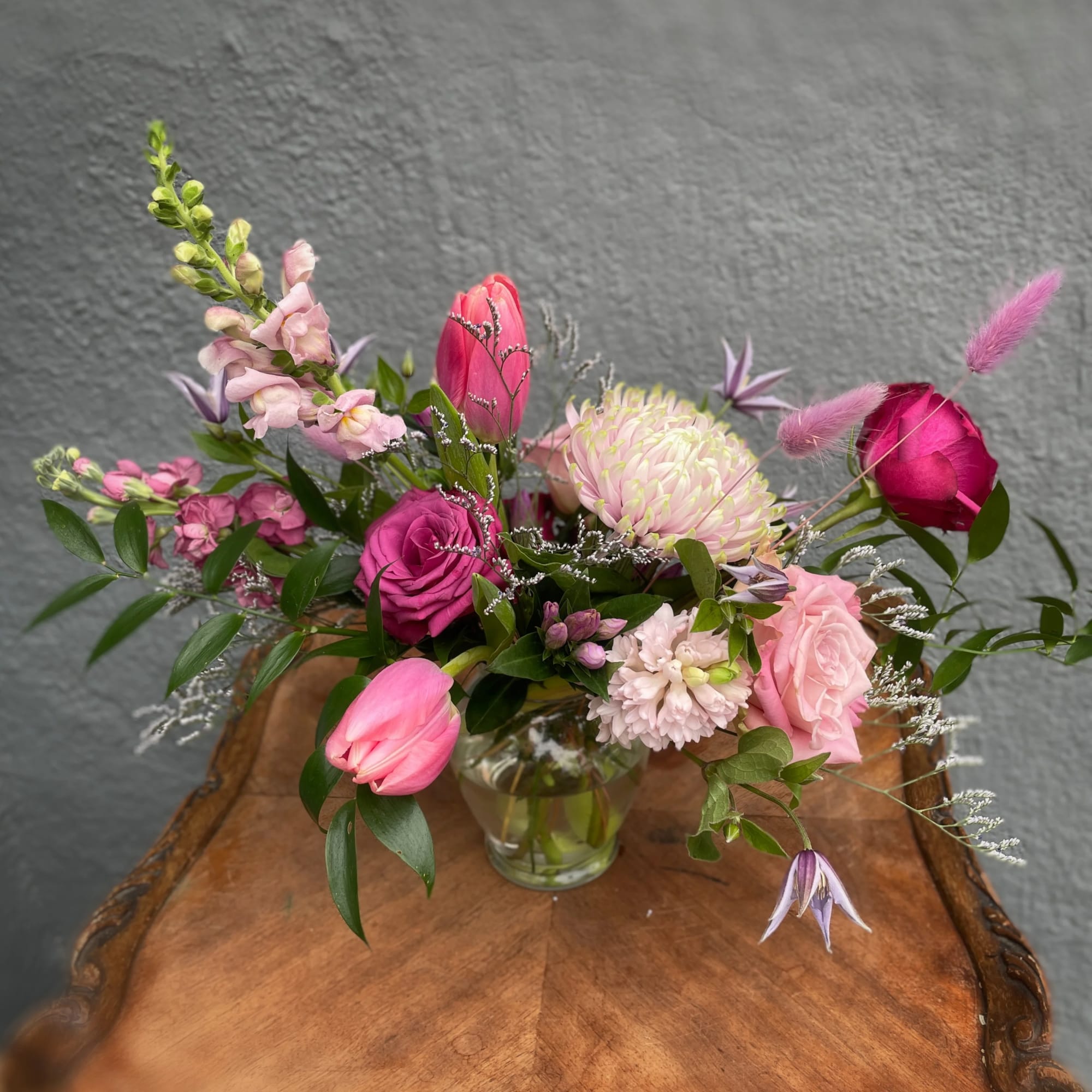 A sweet and free spirited little arrangement in shades of lavender, purple