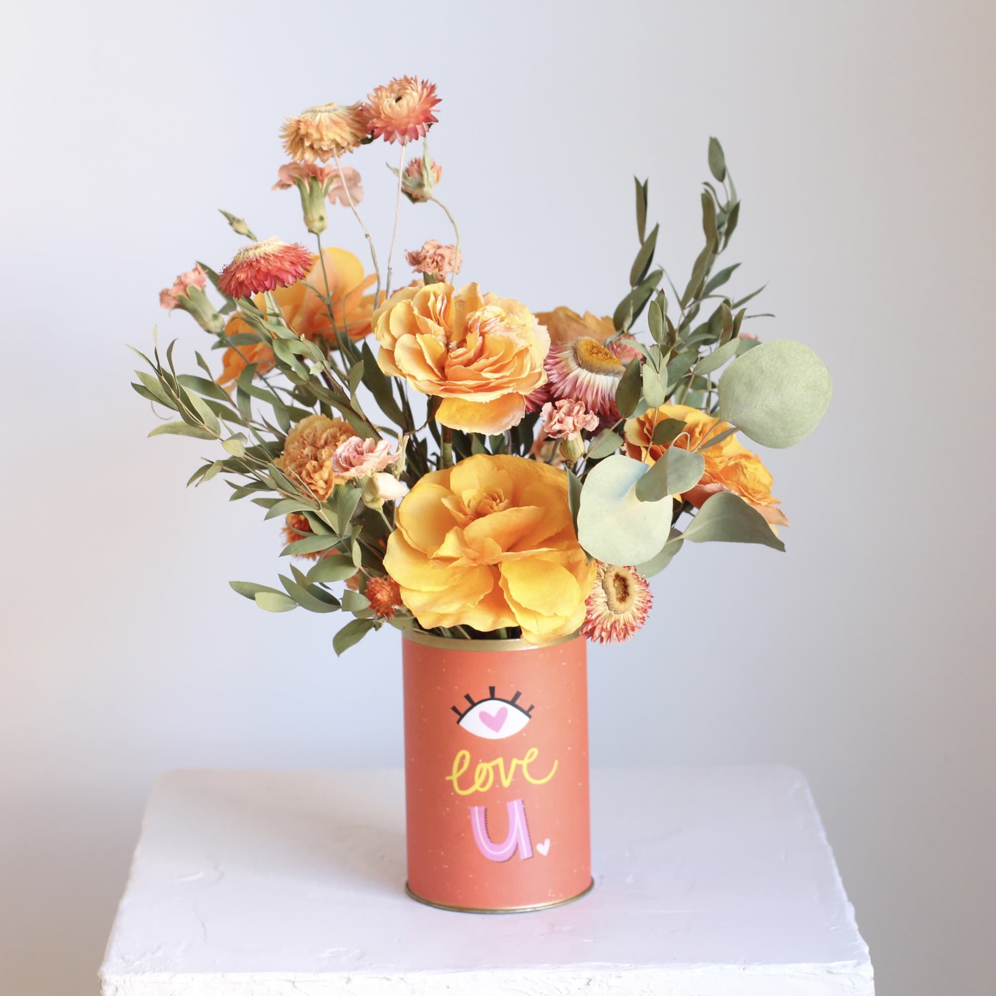 A charming blend of rustic elegance and sentimental charm, this dried floral