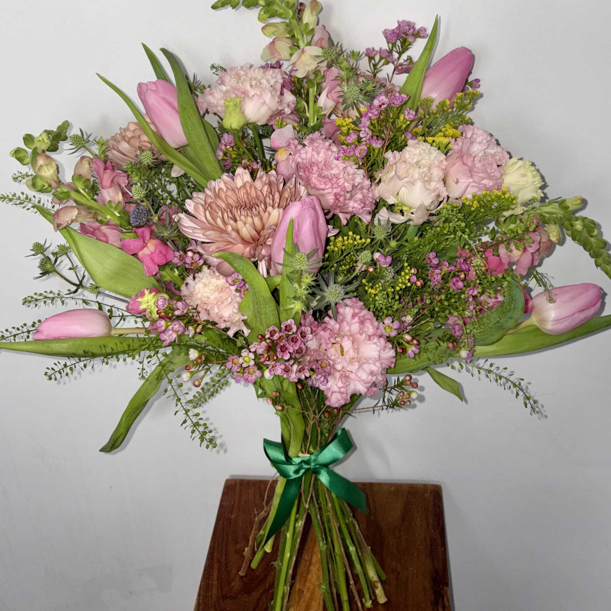 Soft, joyful, and effortlessly charming, this Mixed Pink Floral Bouquet is a