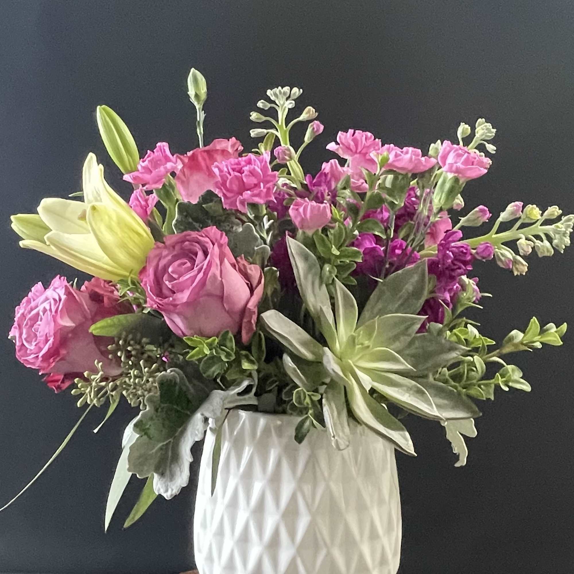 Straight out of a mid-century design magazine, this chic planter is the