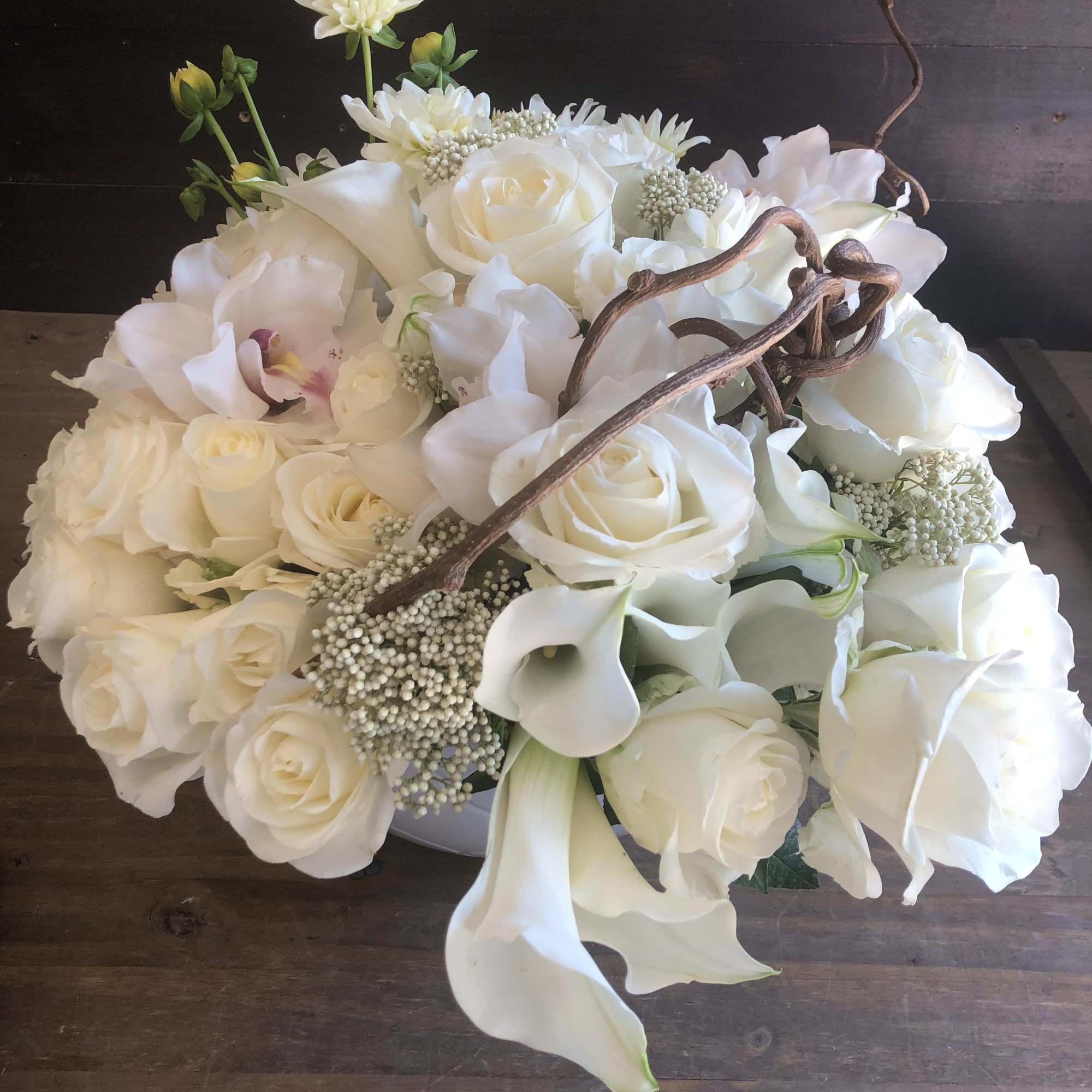 This design will include all white flowers. Some of these flowers may