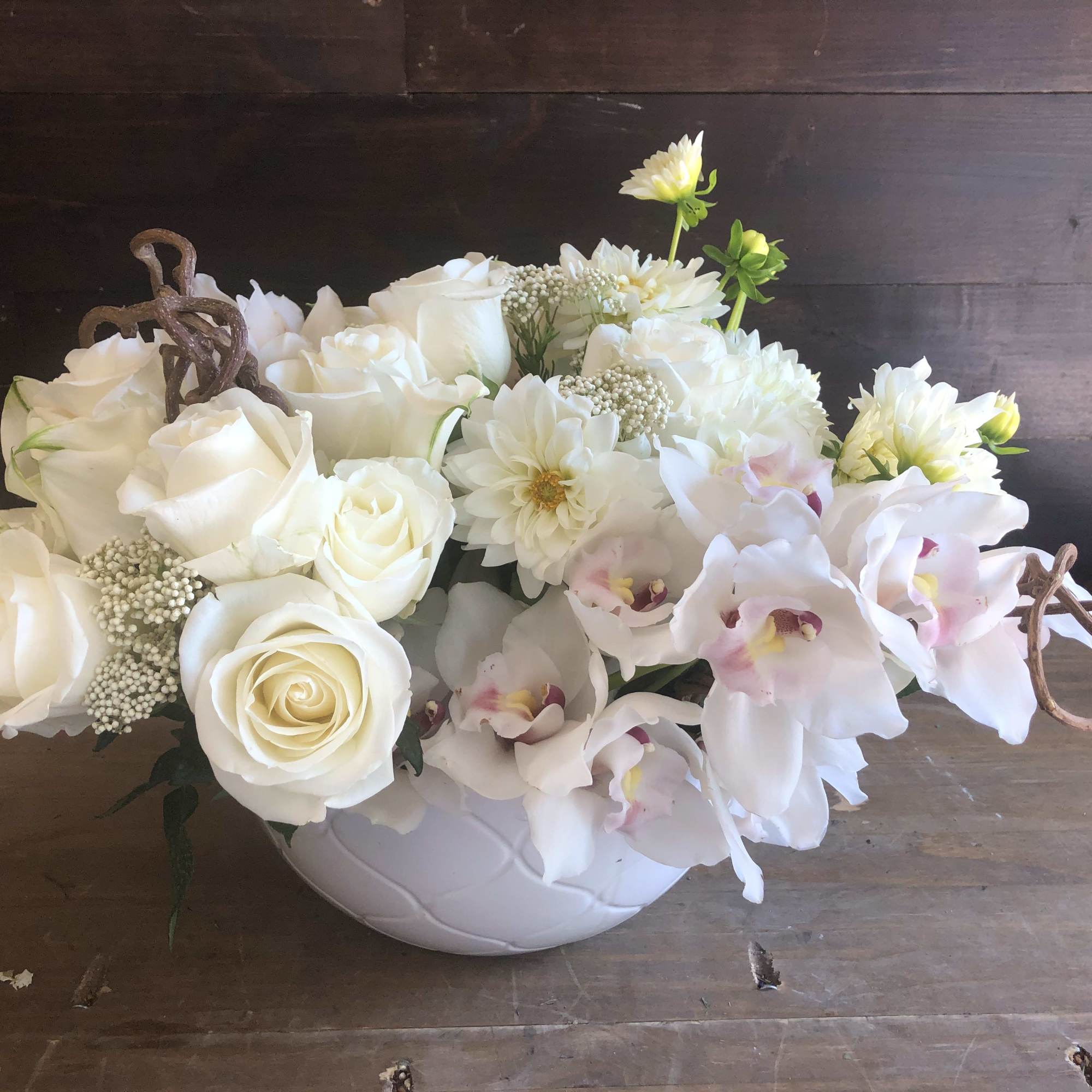 This design will include all white flowers. Some of these flowers may