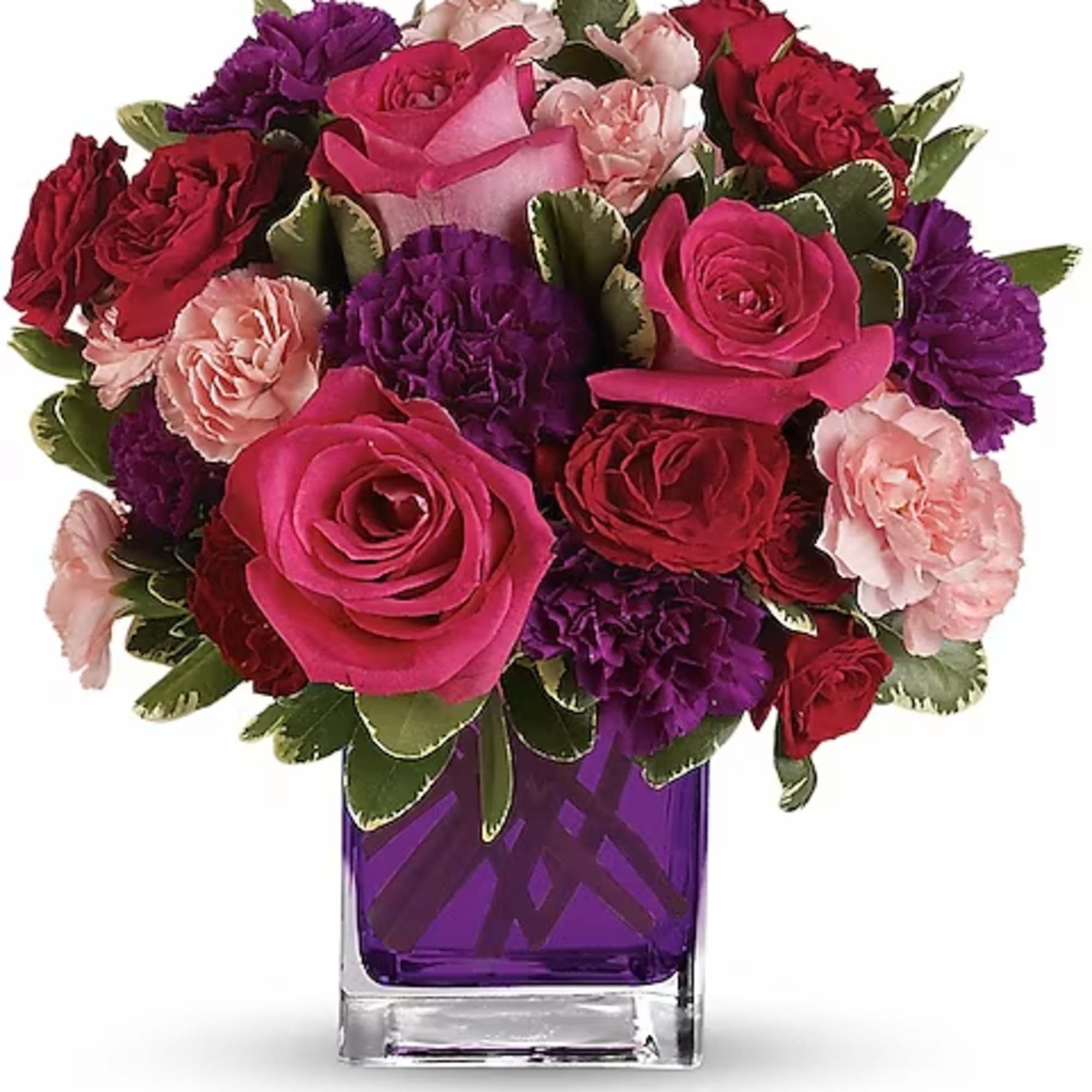 Pure romance. Hot pink roses and dark red spray roses are brightly