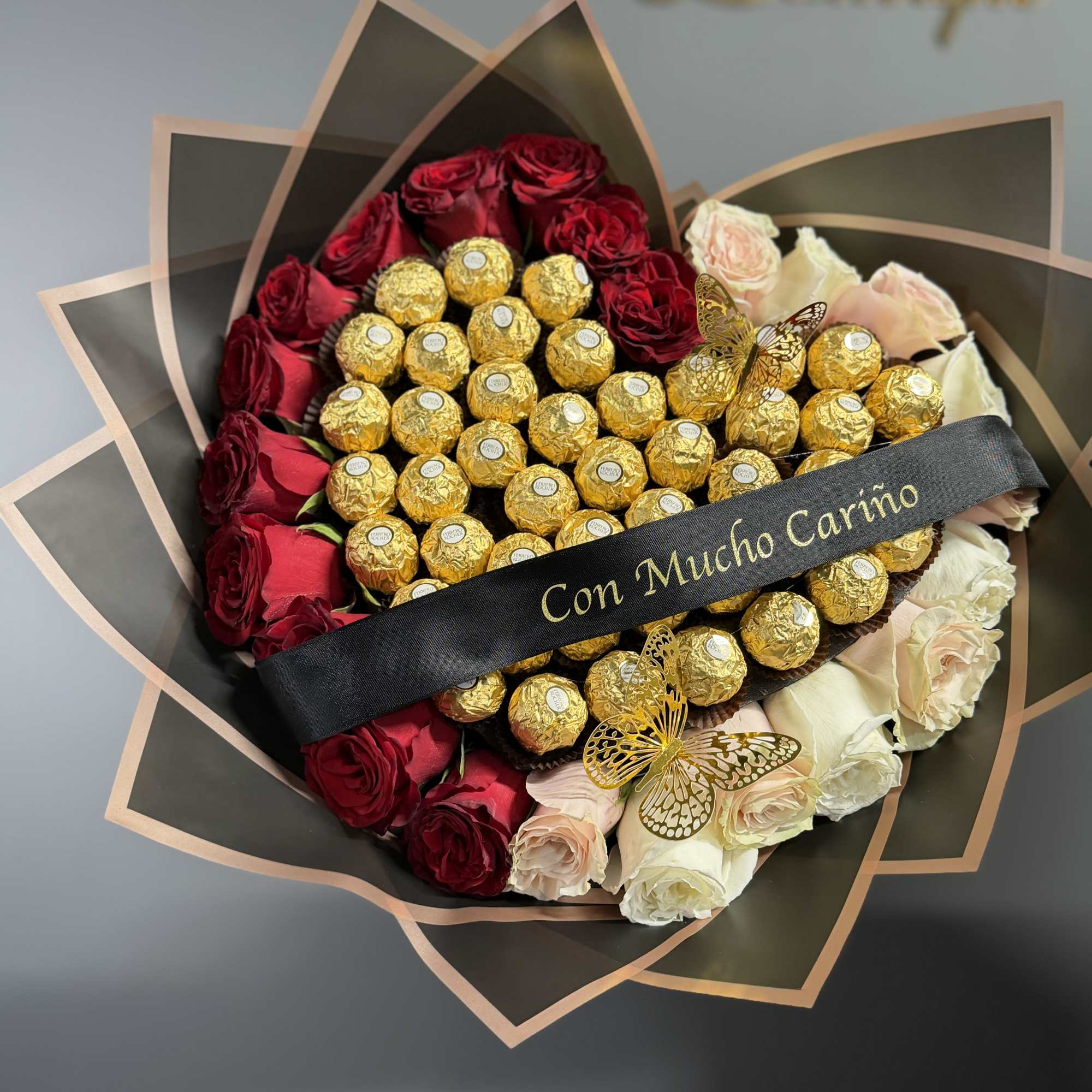 Be Mine Heart is a show-stopping heart-shaped wrapped bouquet designed to captivate