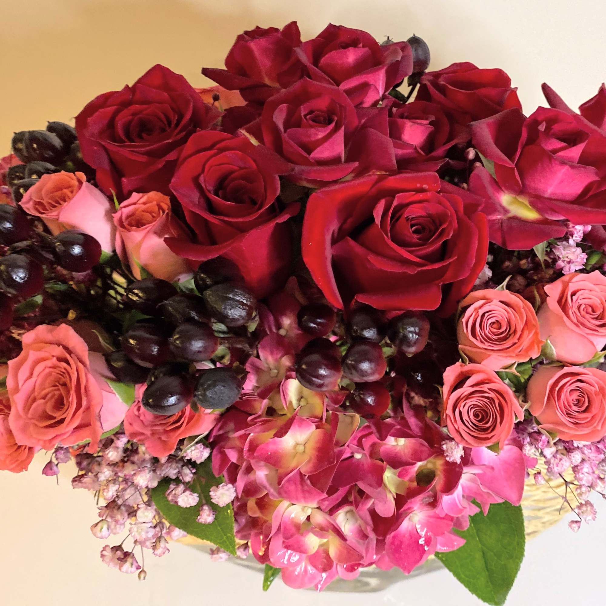 The heart throb is a lush stylized floral arrangement with mixture of