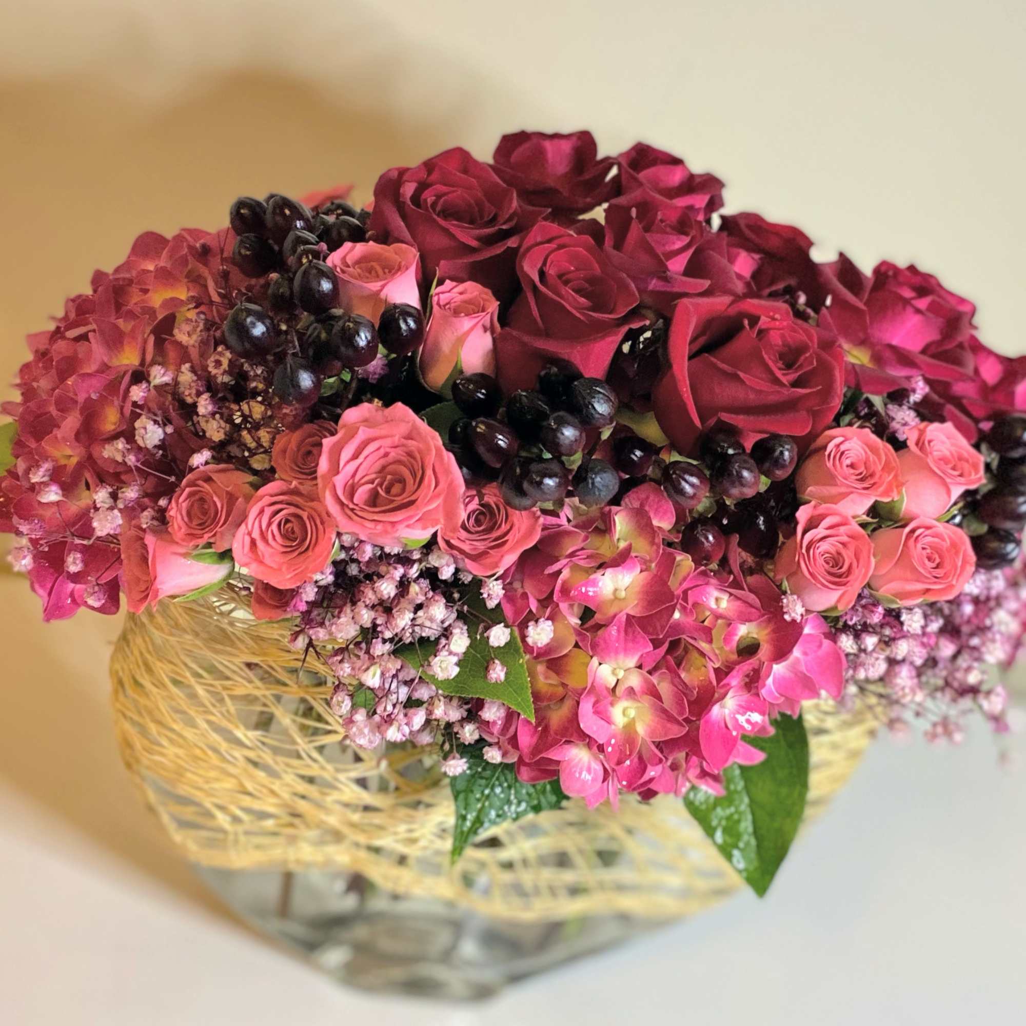 The heart throb is a lush stylized floral arrangement with mixture of