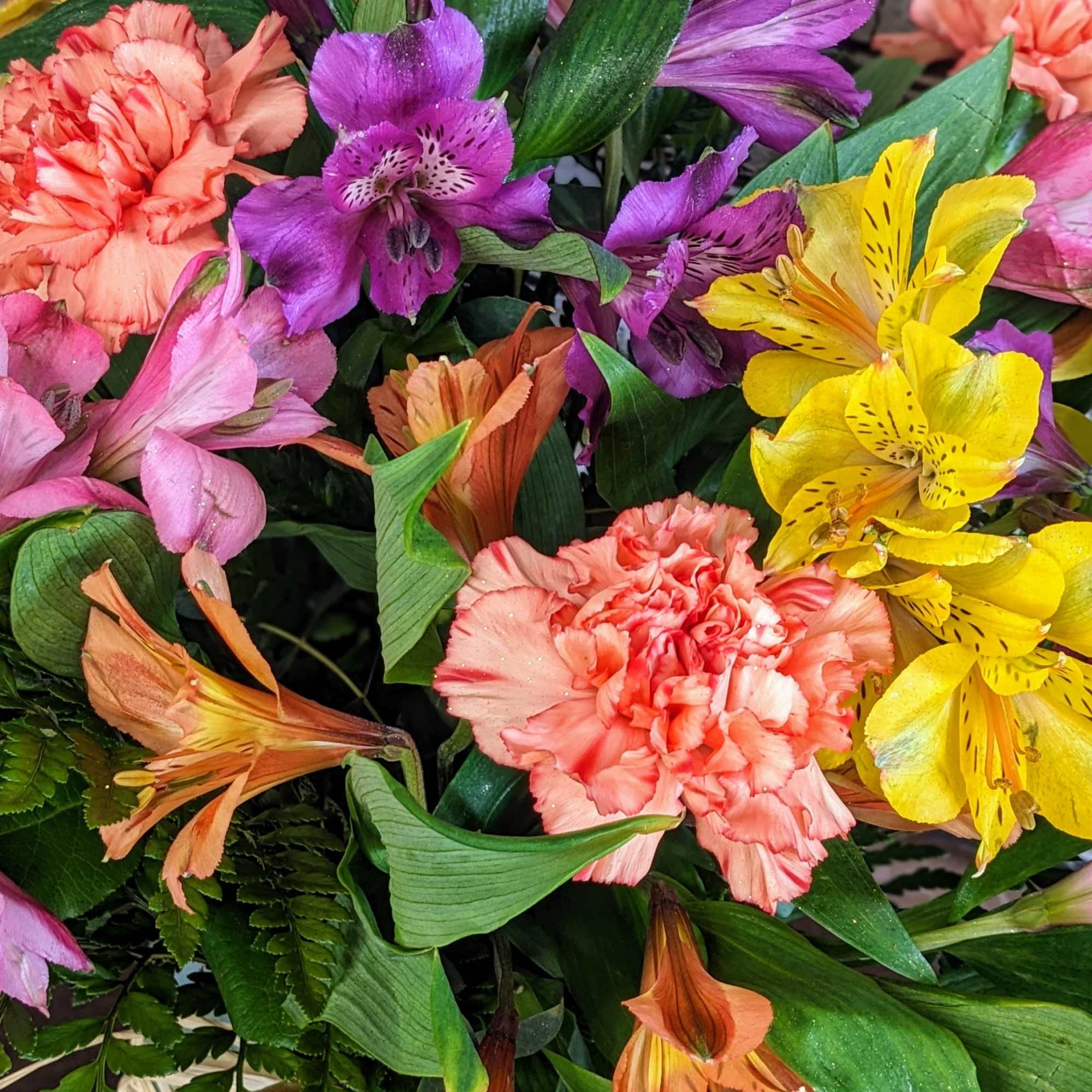 Our Awesome Alstroemeria floral arrangement is a vibrant and cheerful display that