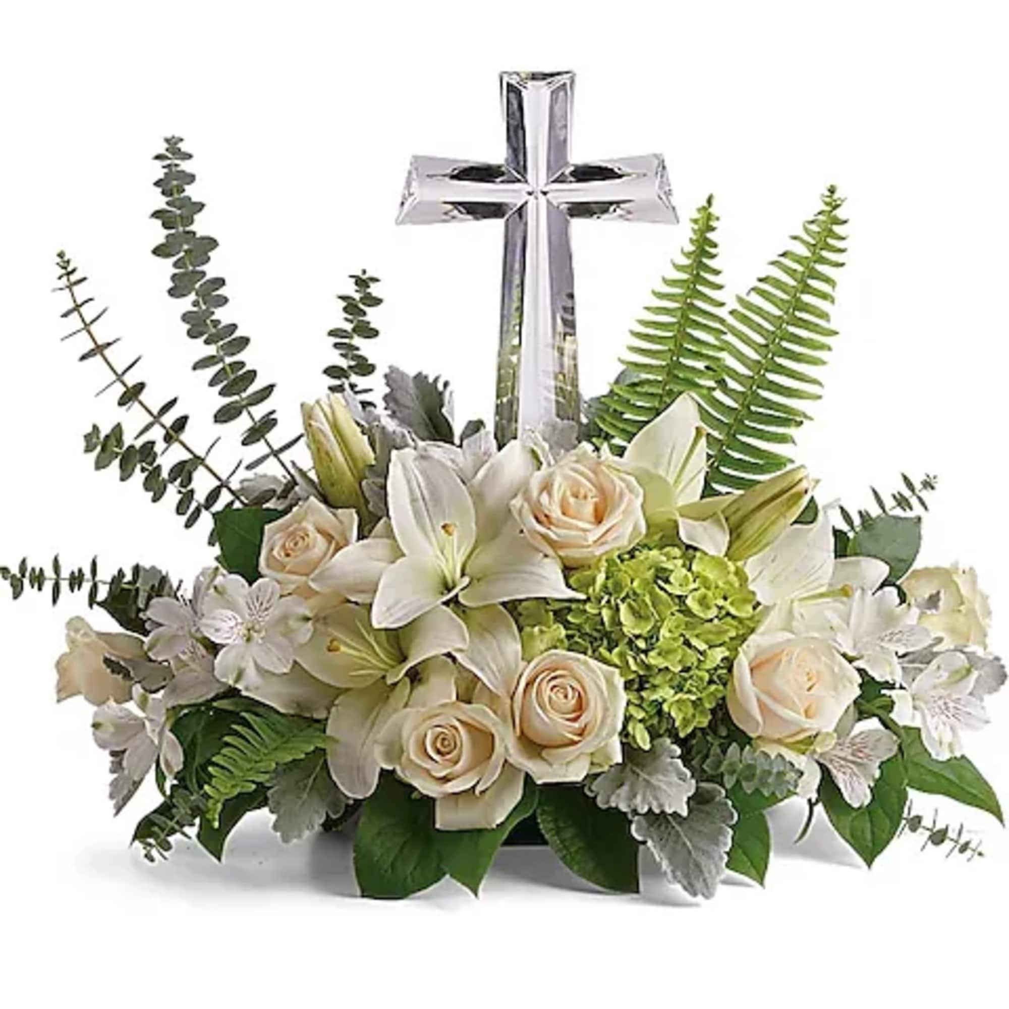 This peaceful bouquet of soft white flowers and green accents is a