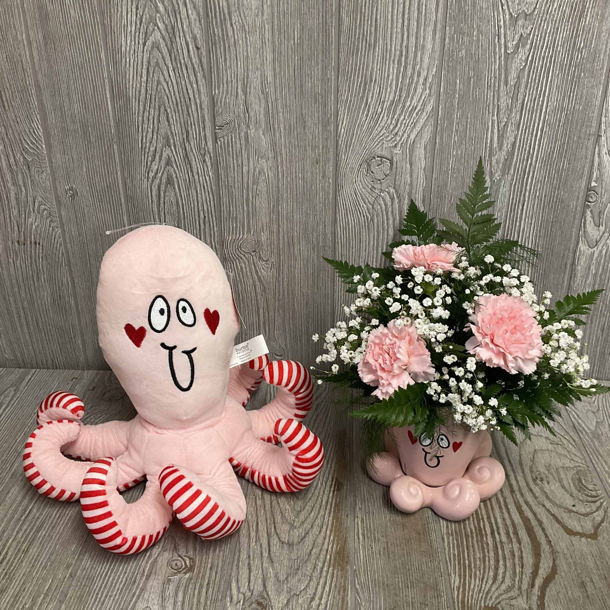 This sweet pink octopus arrangement is set in a keepsake ceramic vase