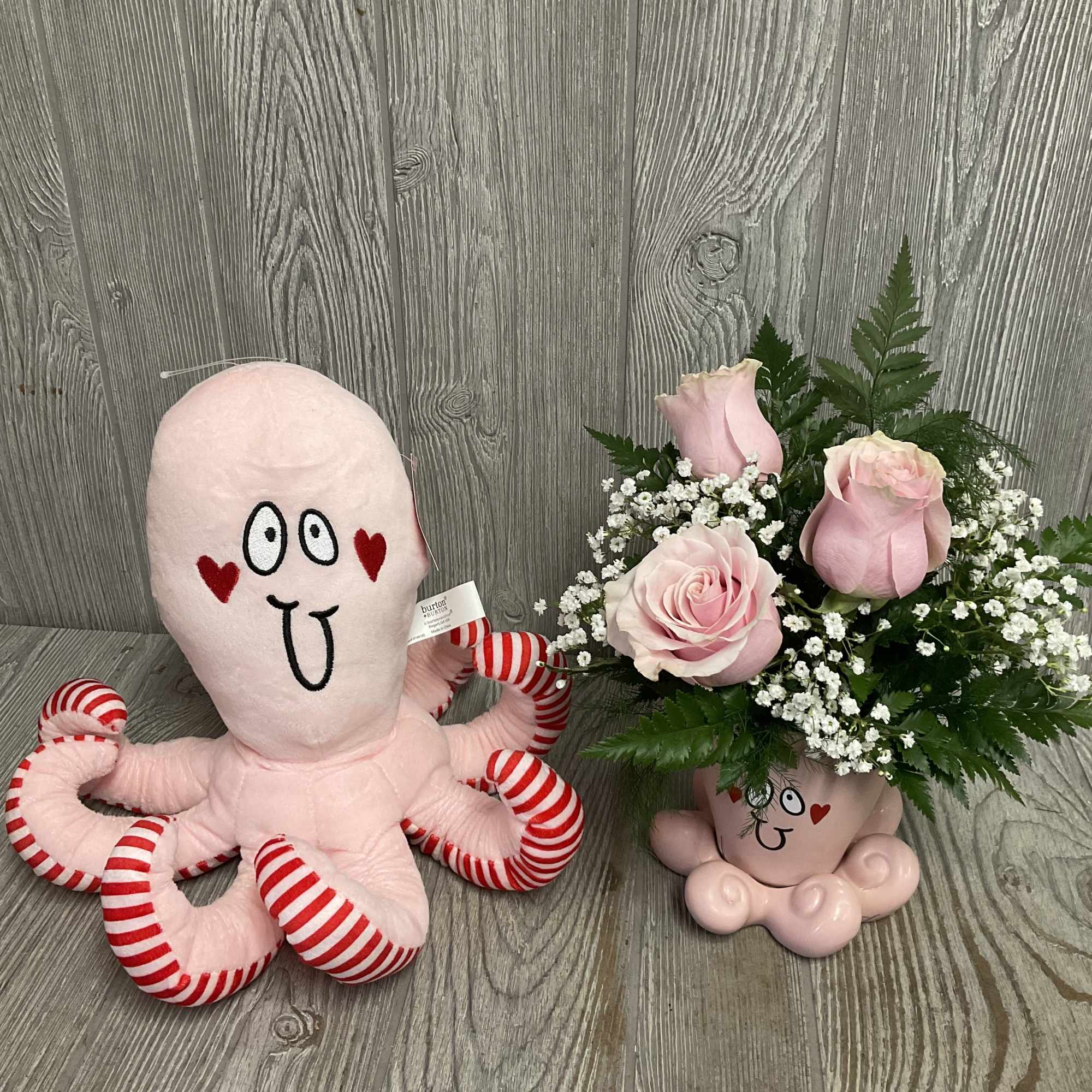This sweet pink octopus arrangement is set in a keepsake ceramic vase