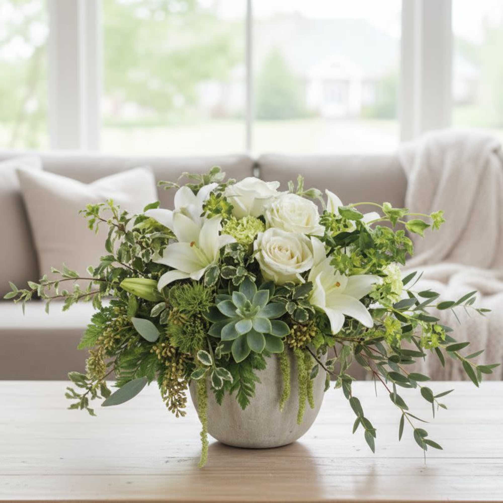 Bring flourishing beauty to any occasion with this naturally elegant arrangement of