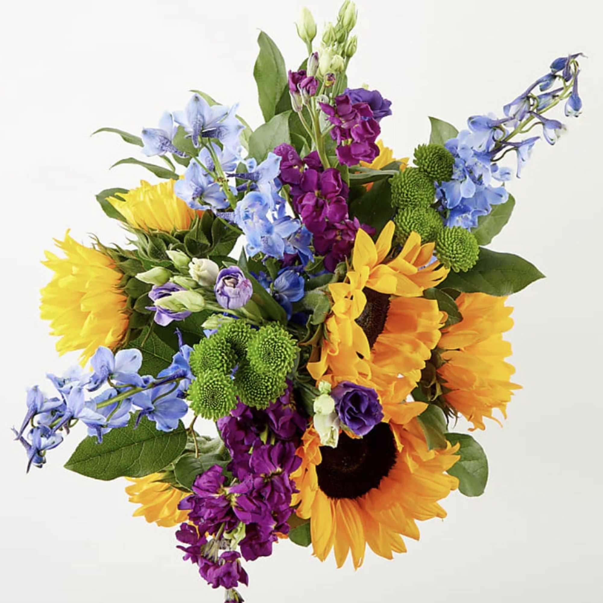 Travel to a warm summer day with the Catching Rays Bouquet, a