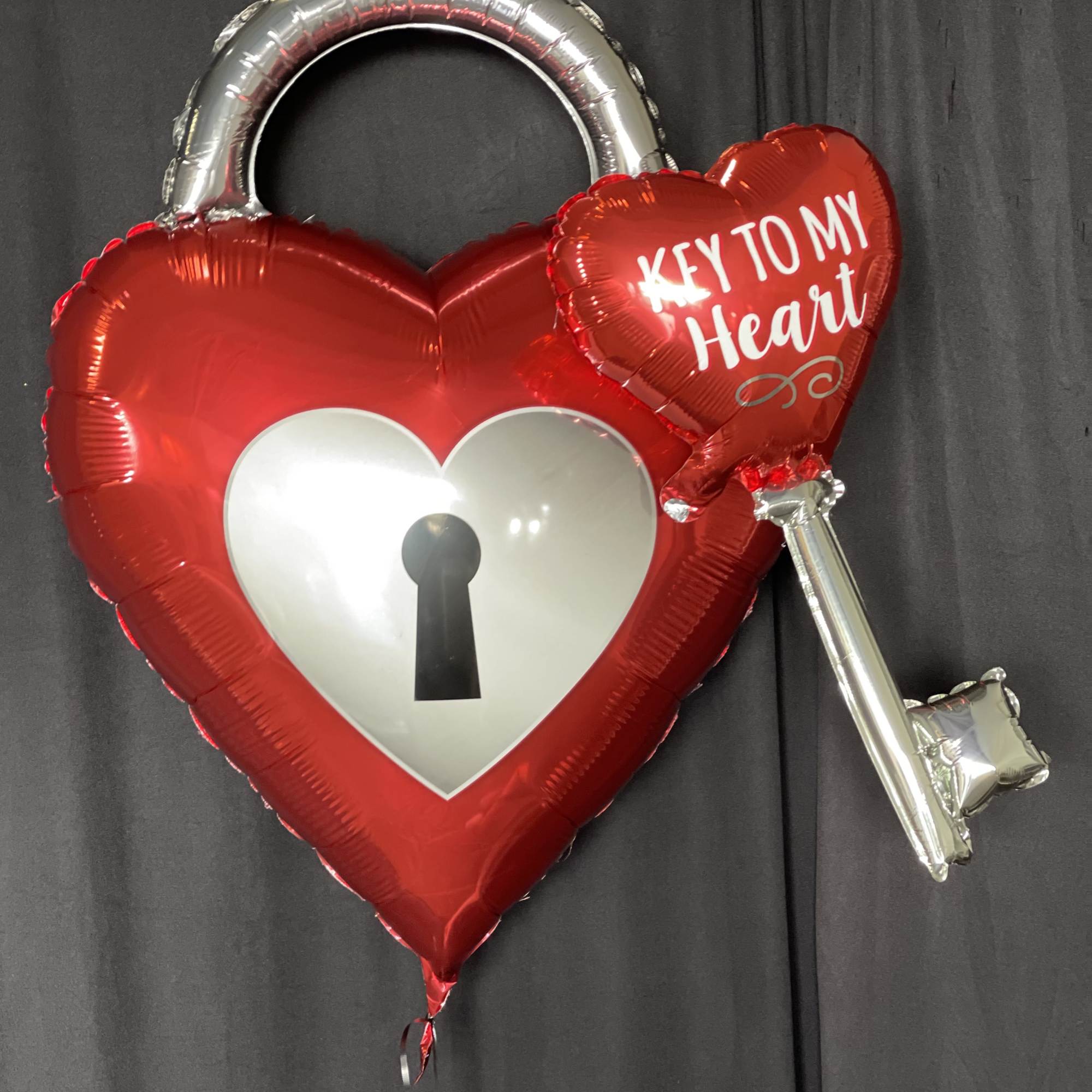 Unlock the perfect romance with our 32-Inch Key to My Heart Balloon!