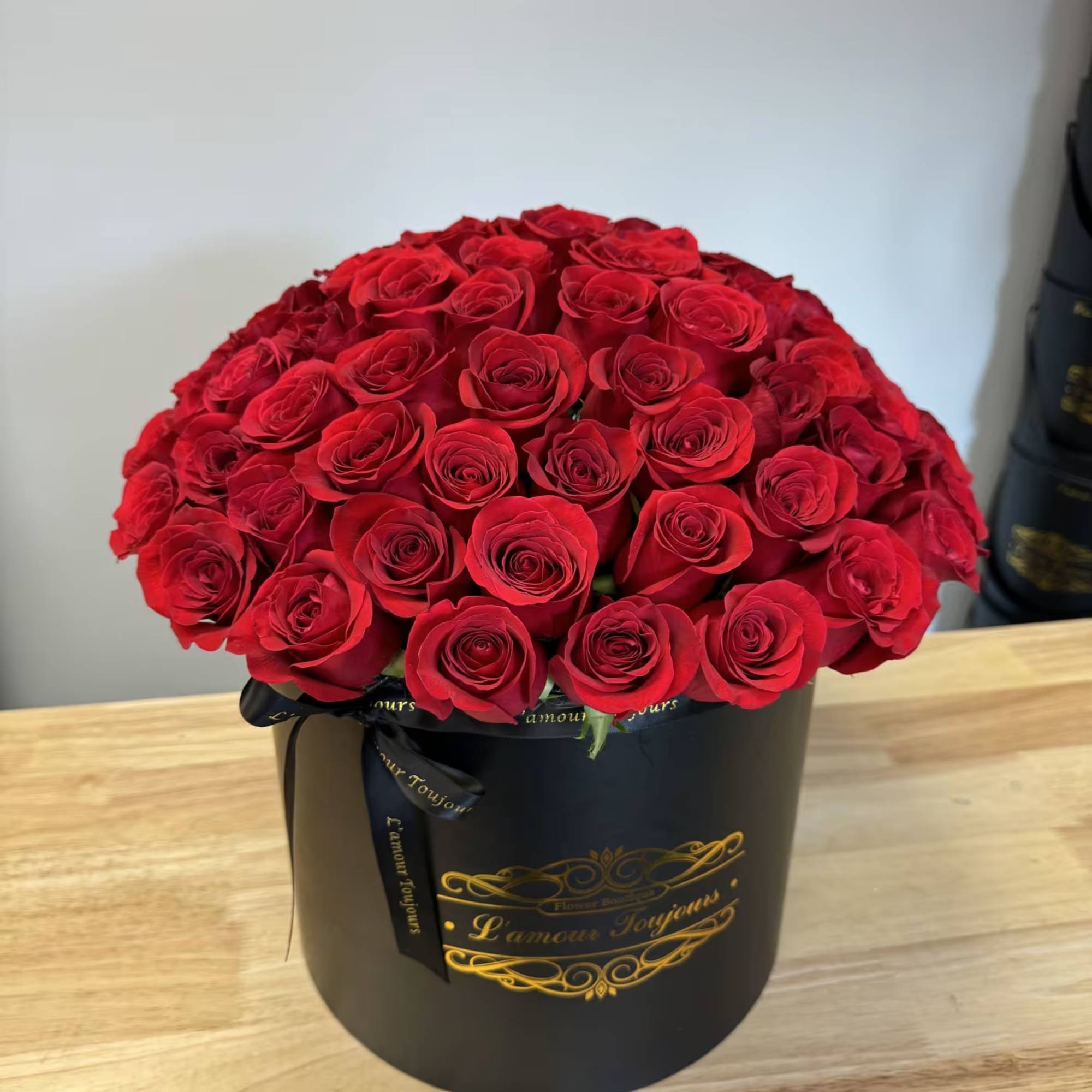 75 Premium roses in a Signature Box