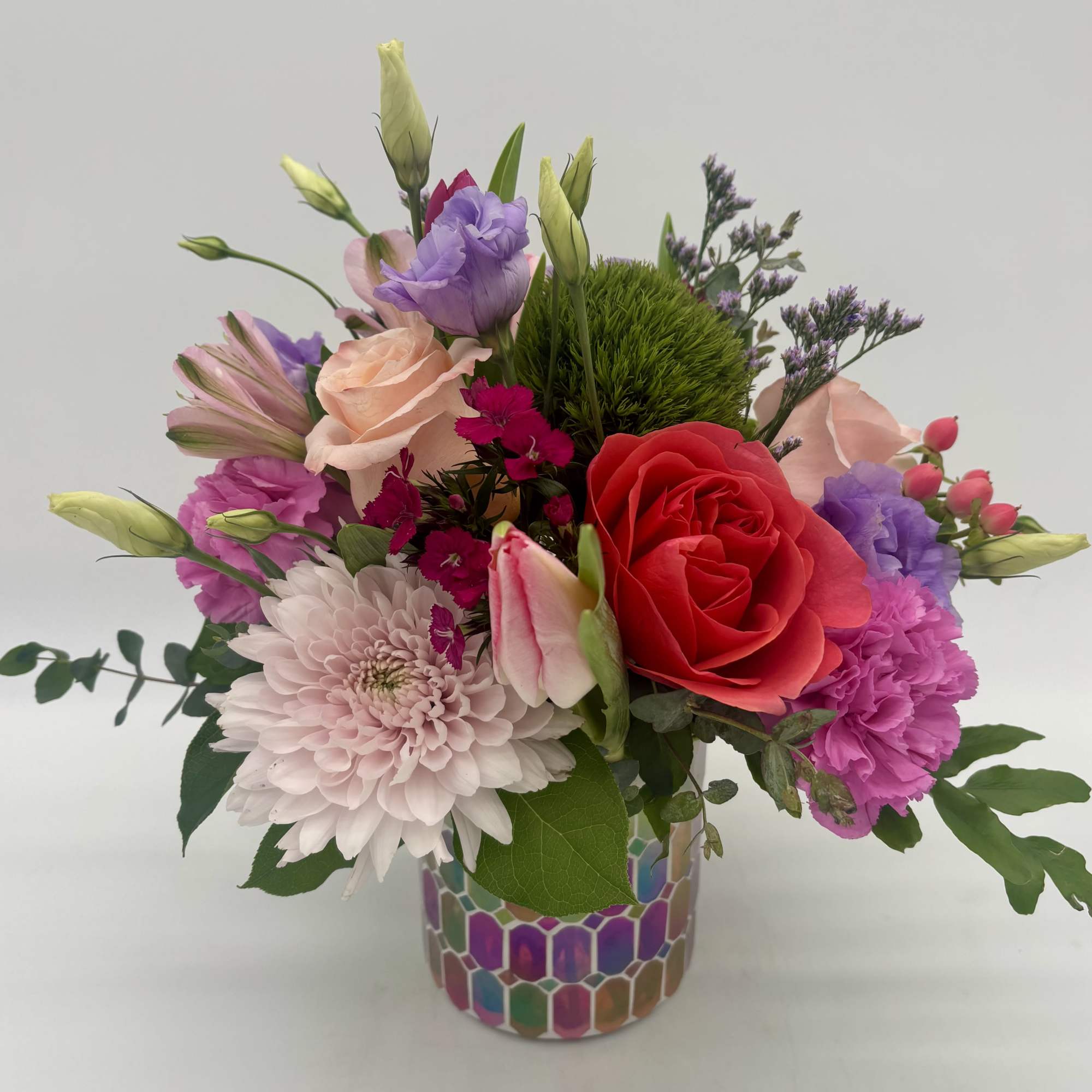 Dance the night away with this bright and groovy disco inspired arrangement.