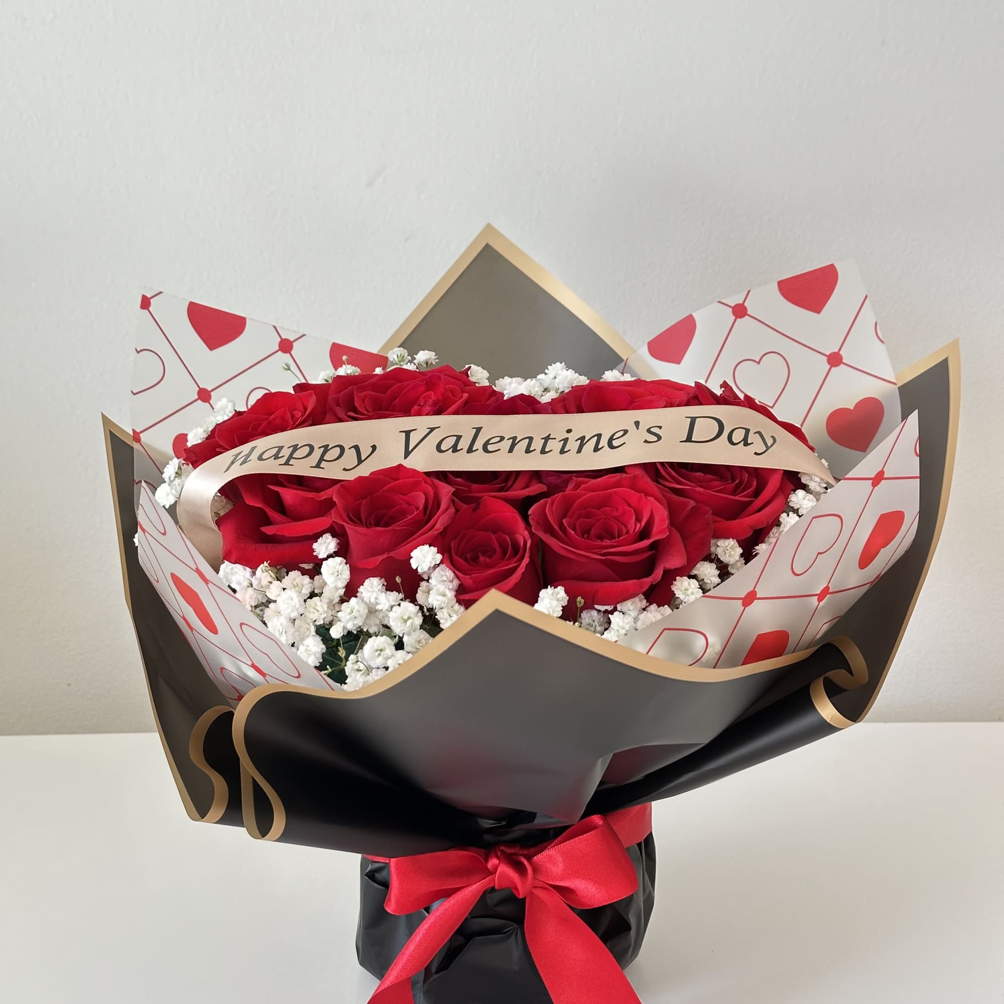 Remind her why she is special with this handcrafted heart-shaped floral arrangement.