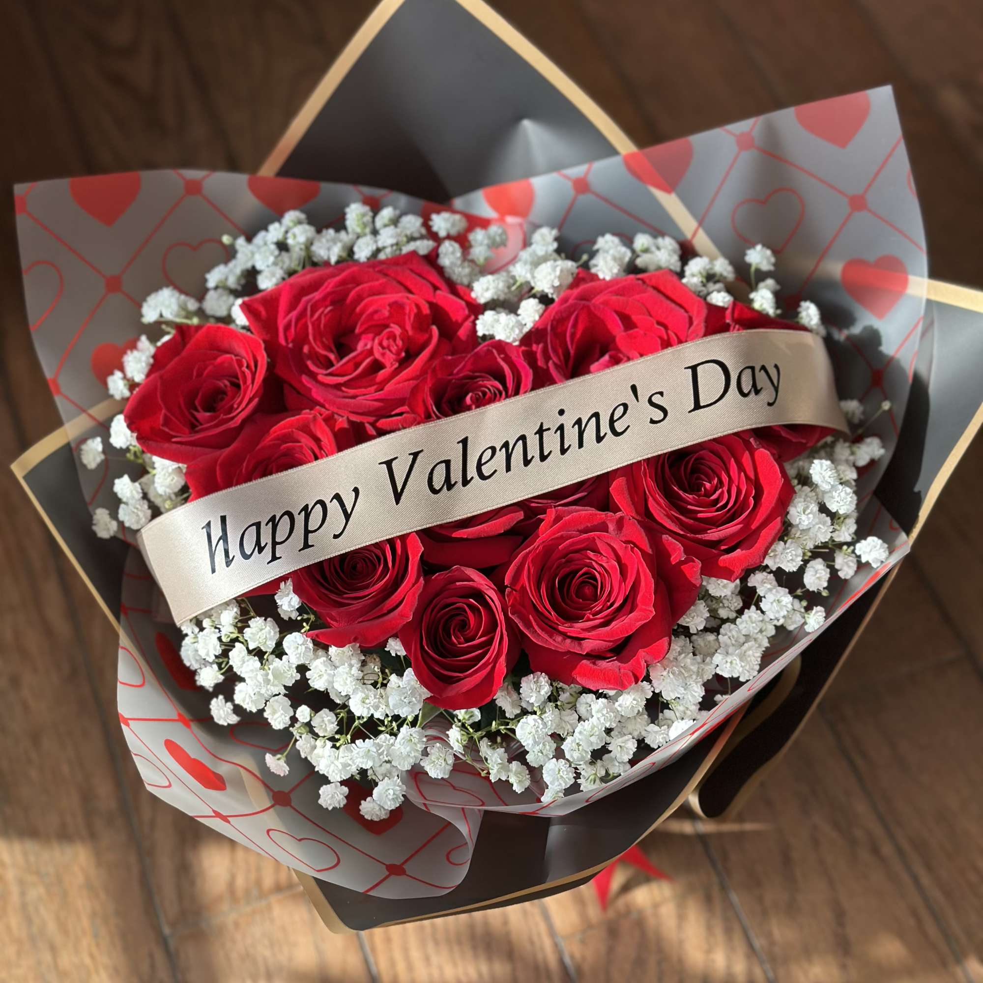 Remind her why she is special with this handcrafted heart-shaped floral arrangement.