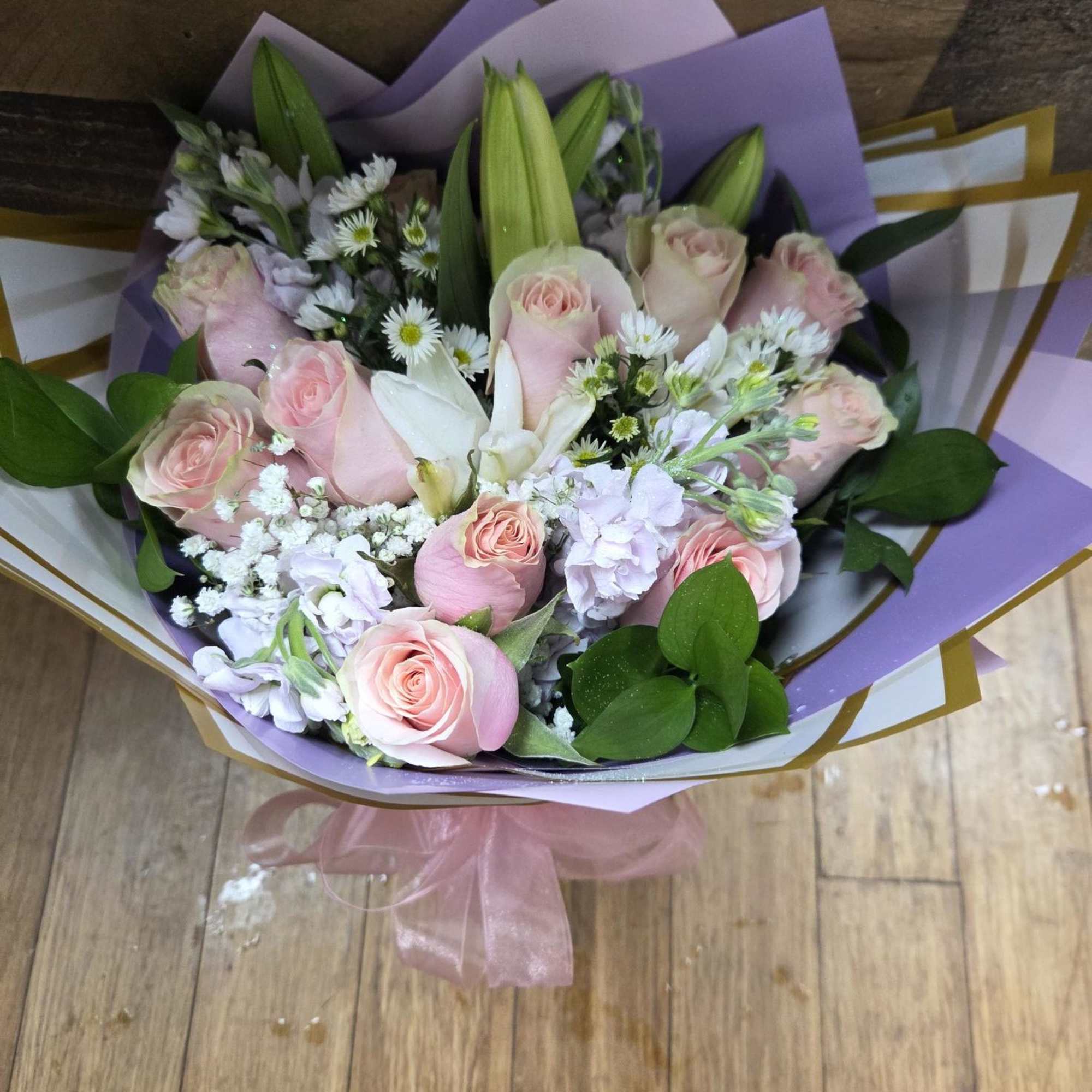 white lilies, lavender stock, pink roses, white monte casino 