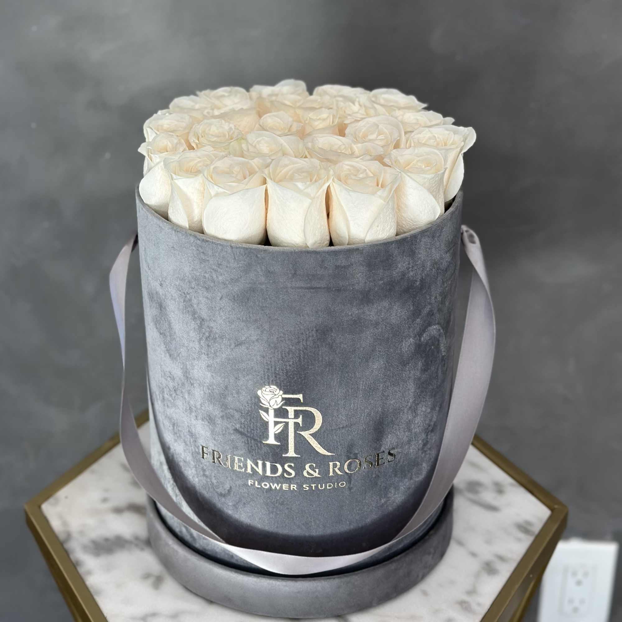 A stunning rose arrangement presented in our signature box makes a wonderful