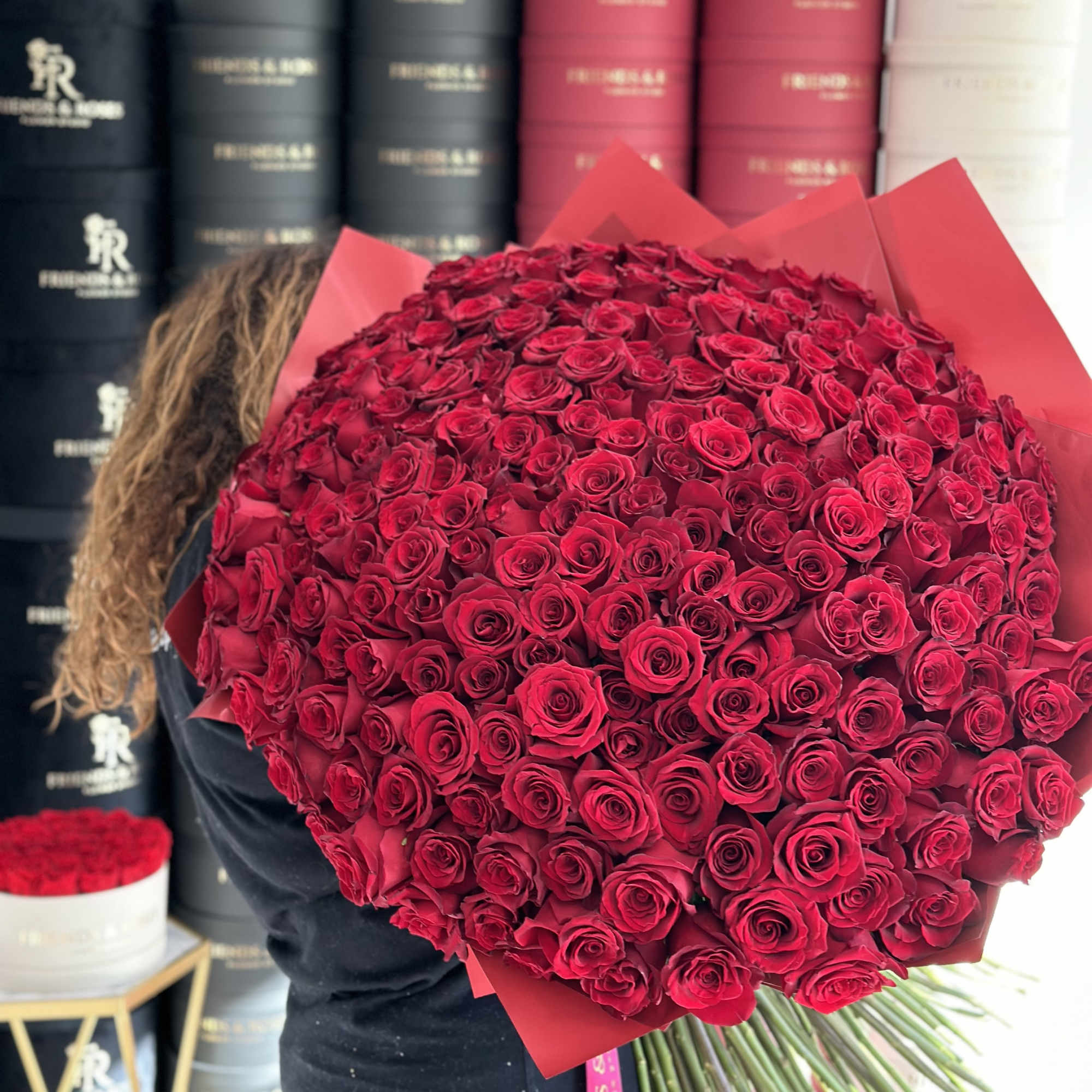 A gorgeous floral arrangement of 250 fresh-cut red roses is a unique