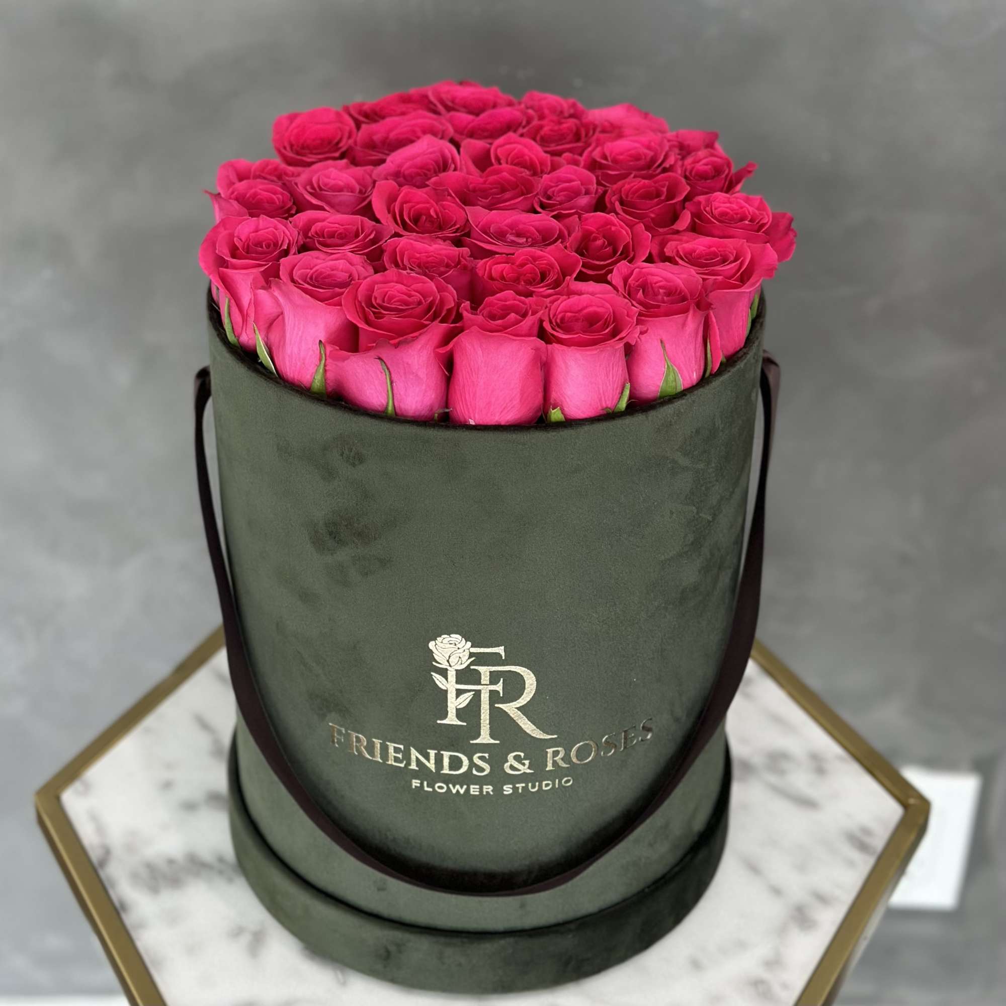 Hot Pink fresh roses in our olive signature box. Beautiful addition to