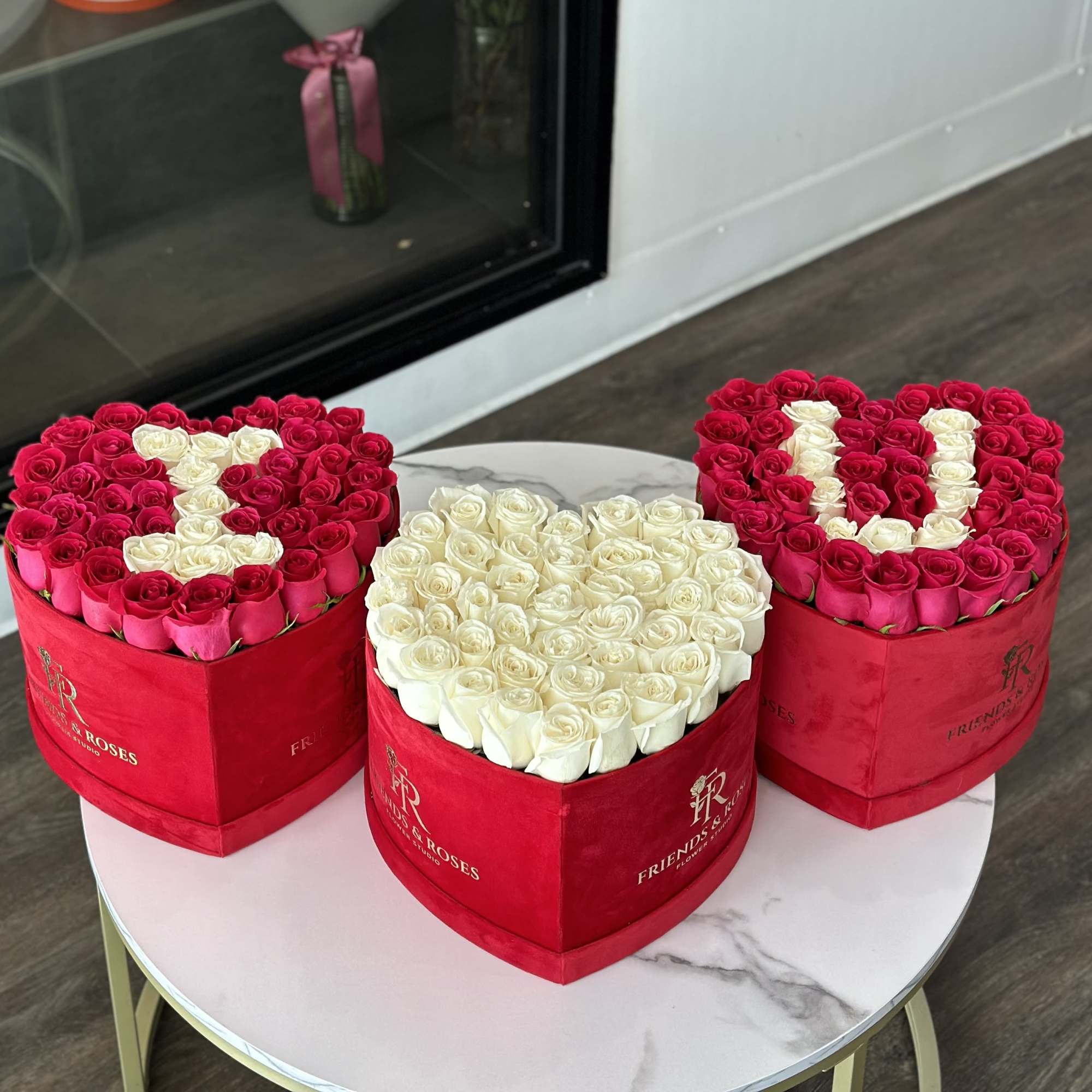 Our 3 heart-shaped box arrangements with fresh roses, and I love your