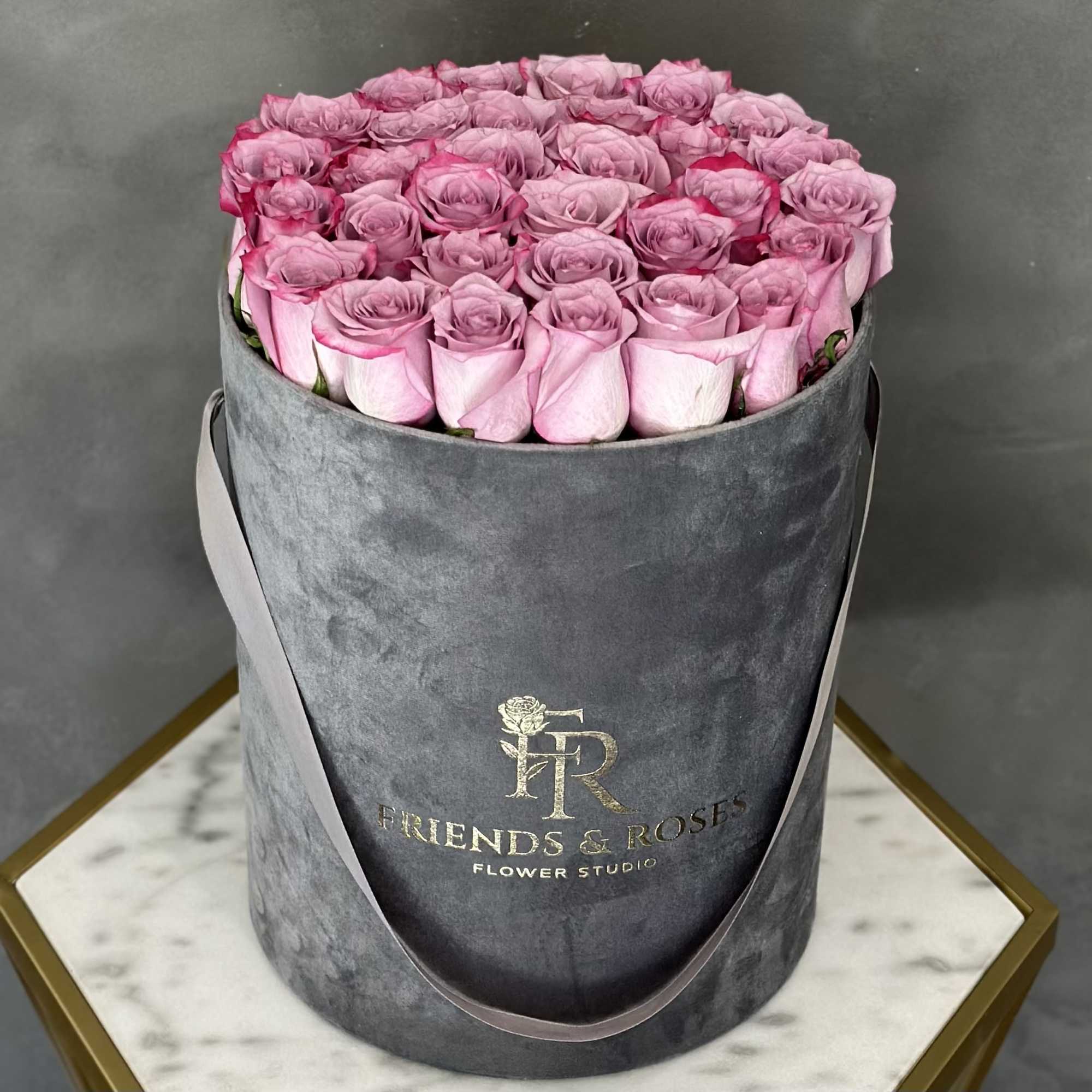 Deep Purple Roses In A Gray Velvet Box