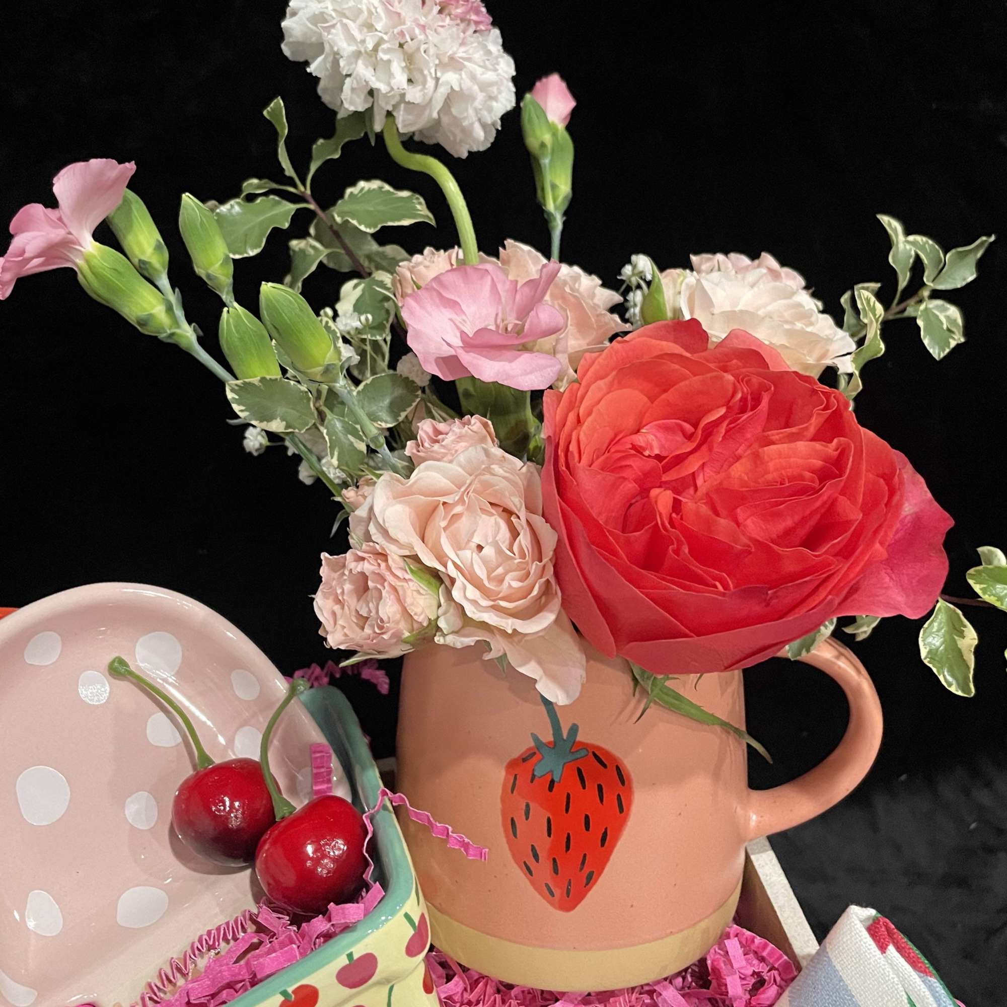 The Berry Basket includes a charming red gingham wooden box, packed with