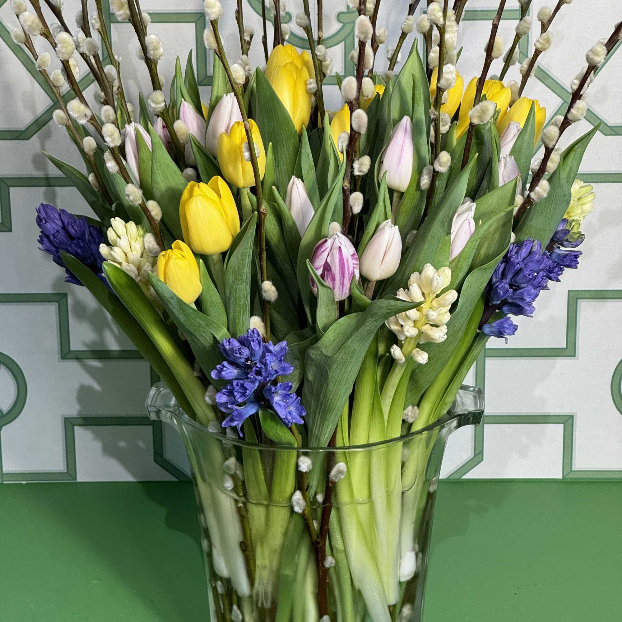 Embrace the lively spirit of spring with Spring Harmony, an enchanting floral