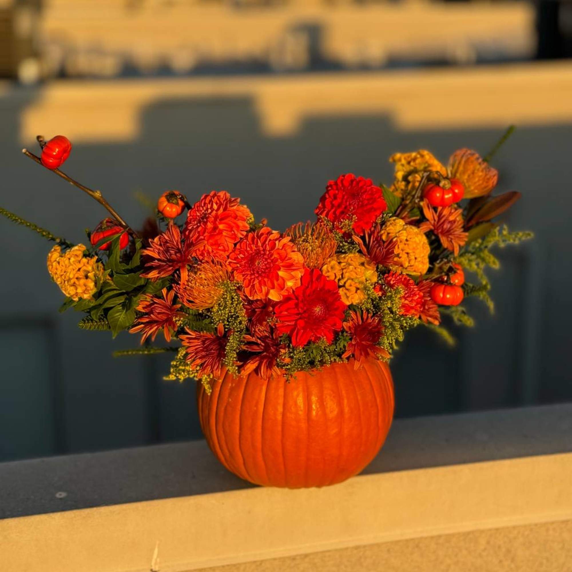 Pumpkin is a cozy autumn arrangement filled with warmth and the golden