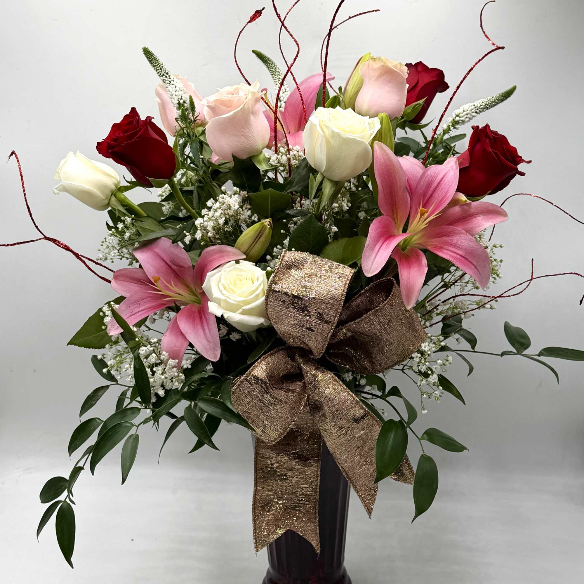 Romance meets elegance in this stunning Valentine's bouquet of red, blush &amp;