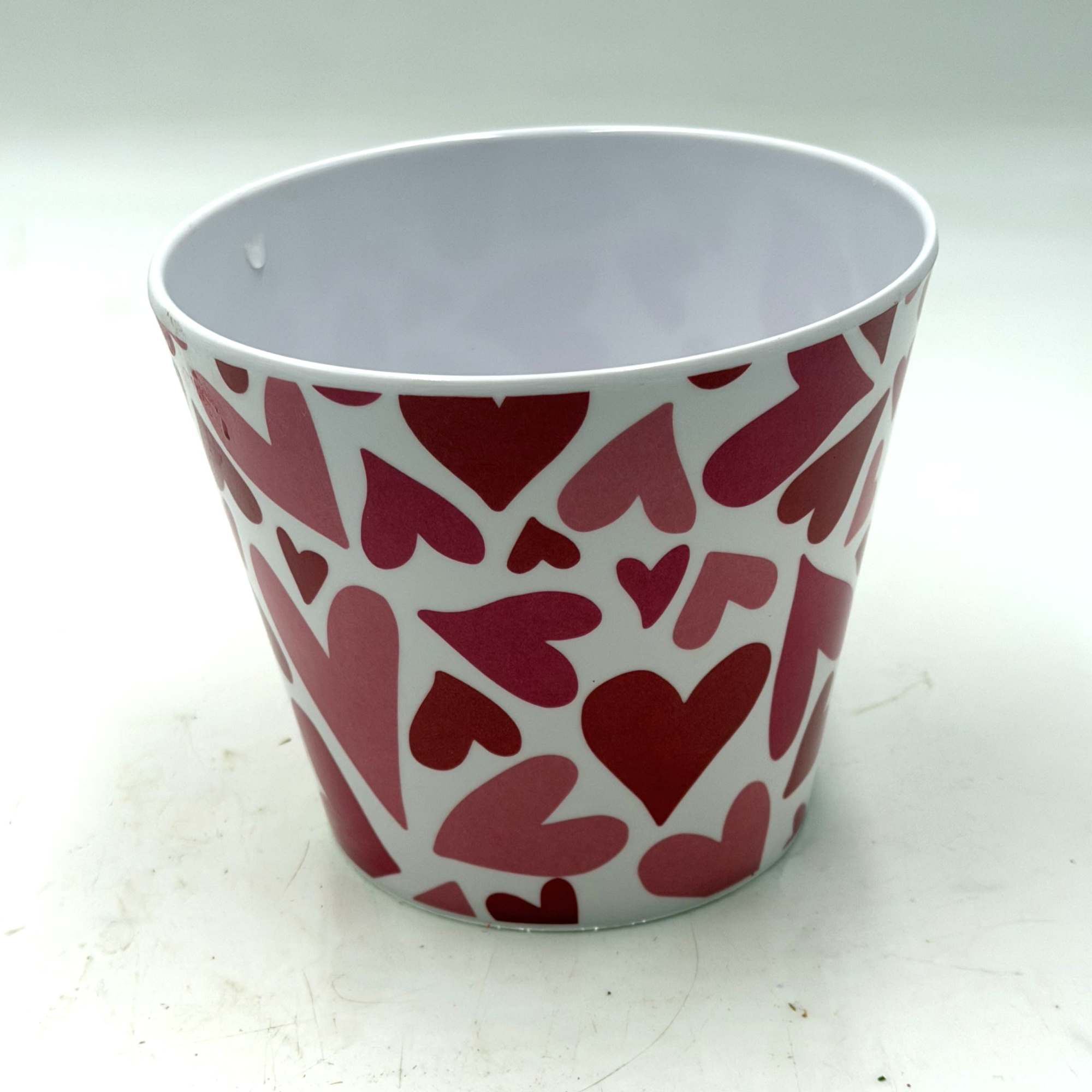 A contemporary take on Valentine's florals, this arrangement features vibrant red roses