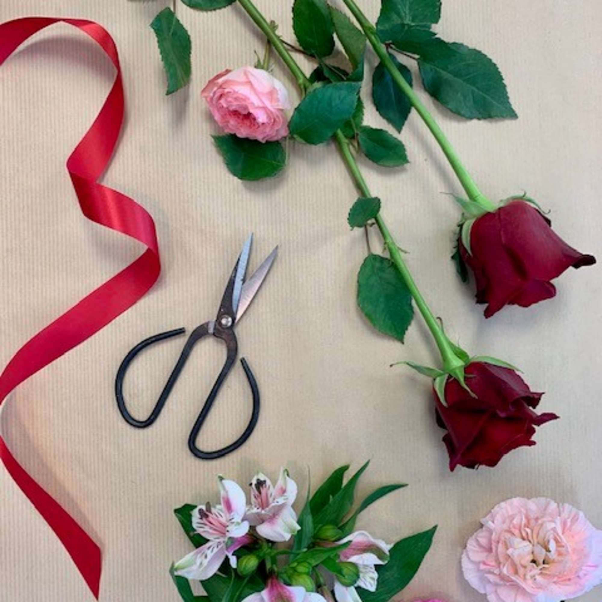 A mix of Valentine hues in reds, pinks, whites and purple flowers