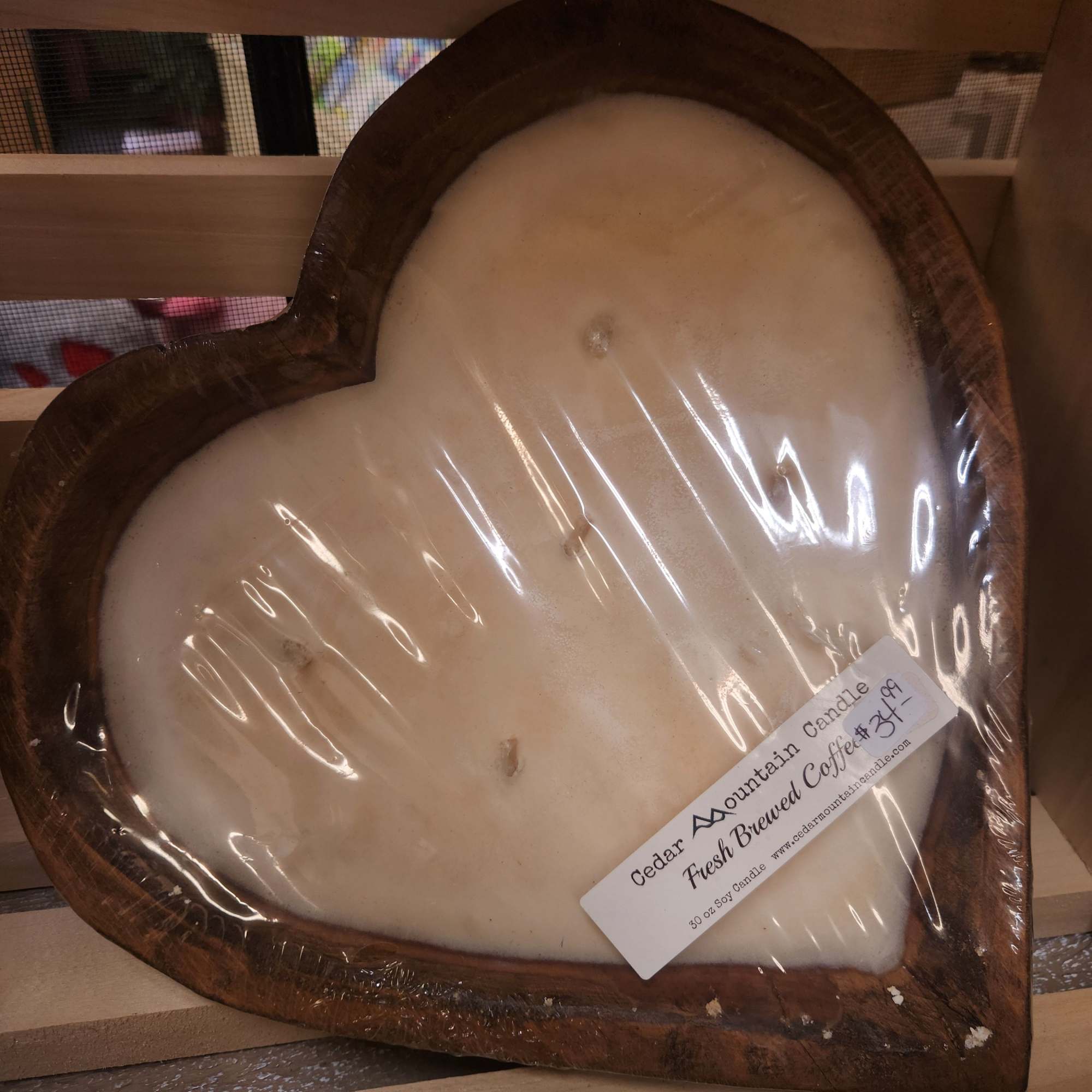 Send your loved one this beautiful, heart shaped 5 wick candle for