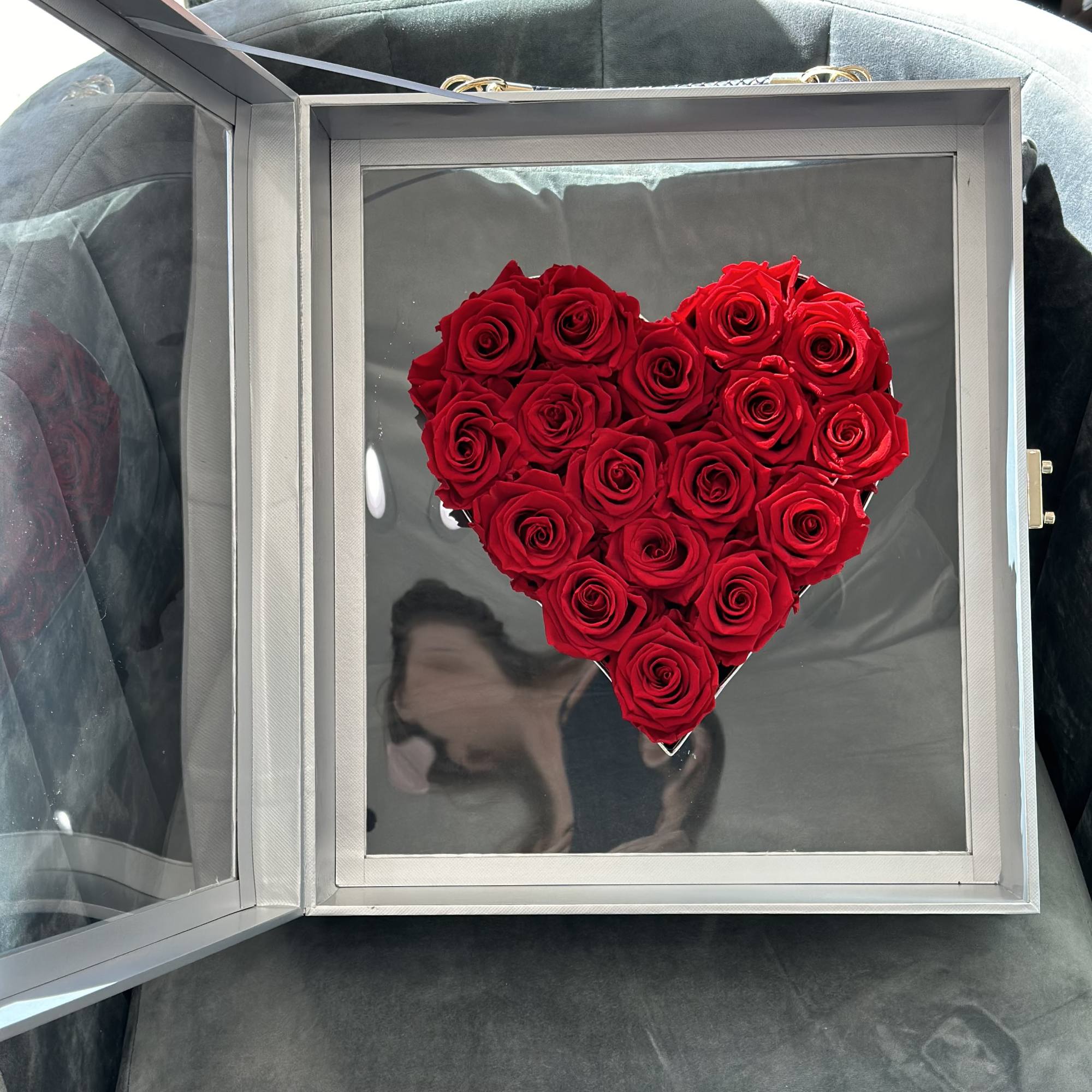Preserved red roses in a heart suitcase box. Everyone will adore this