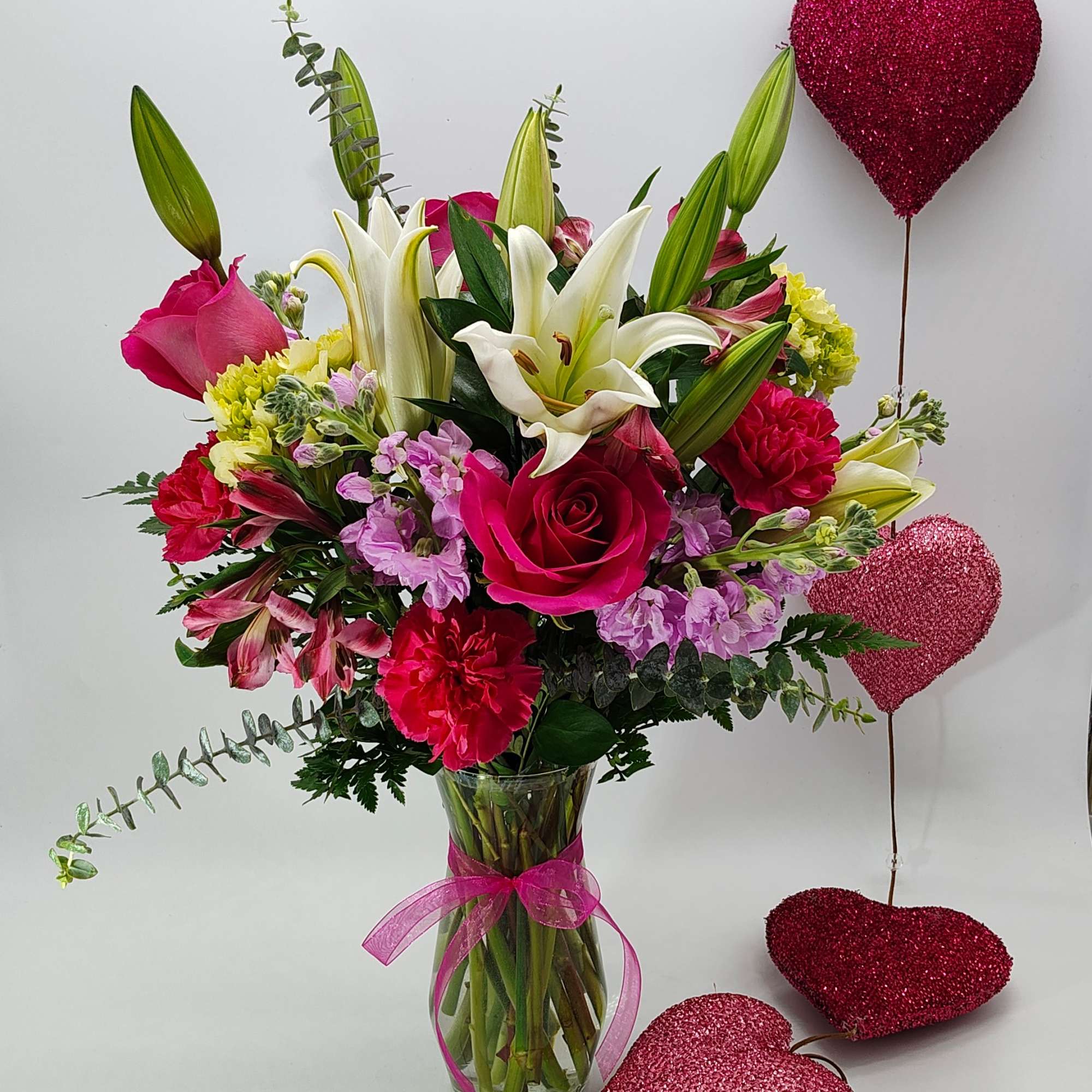 A  mix of hot pink, pink and white flowers. Lots of