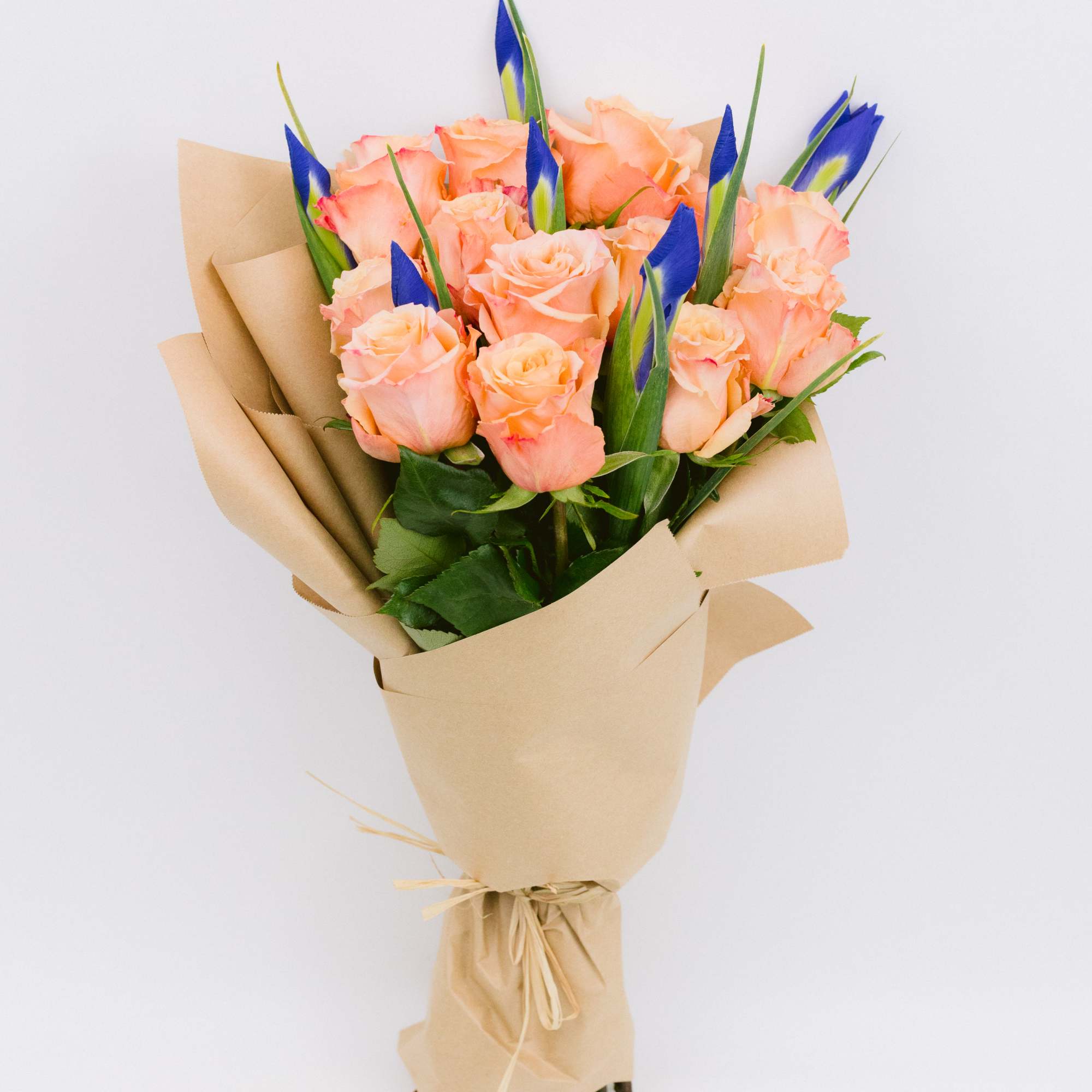 Bouquet of peach roses and irises 